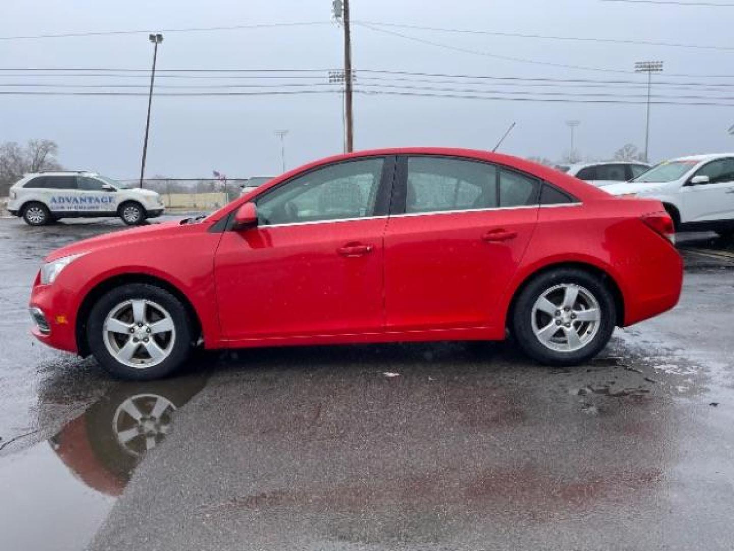 2015 Red Hot Chevrolet Cruze 1LT Auto (1G1PC5SB5F7) with an 1.4L L4 DOHC 16V TURBO engine, 6-Speed Automatic transmission, located at 1951 S Dayton Lakeview Rd., New Carlisle, OH, 45344, (937) 908-9800, 39.890999, -84.050255 - Photo#2