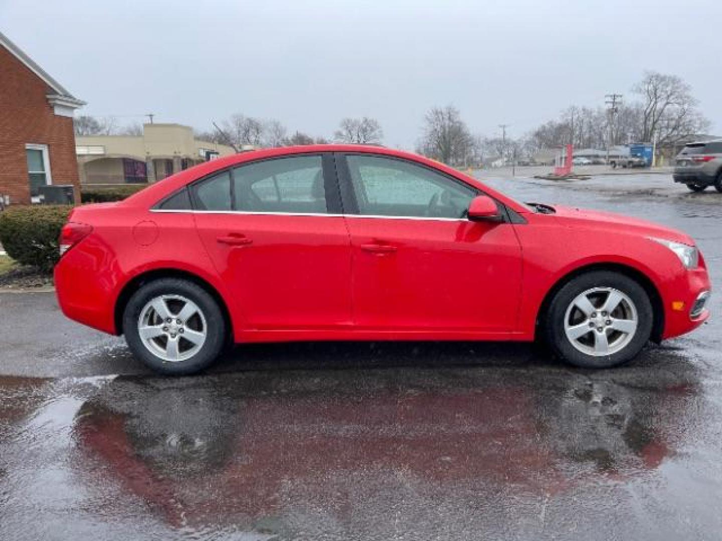 2015 Red Hot Chevrolet Cruze 1LT Auto (1G1PC5SB5F7) with an 1.4L L4 DOHC 16V TURBO engine, 6-Speed Automatic transmission, located at 1951 S Dayton Lakeview Rd., New Carlisle, OH, 45344, (937) 908-9800, 39.890999, -84.050255 - Photo#3