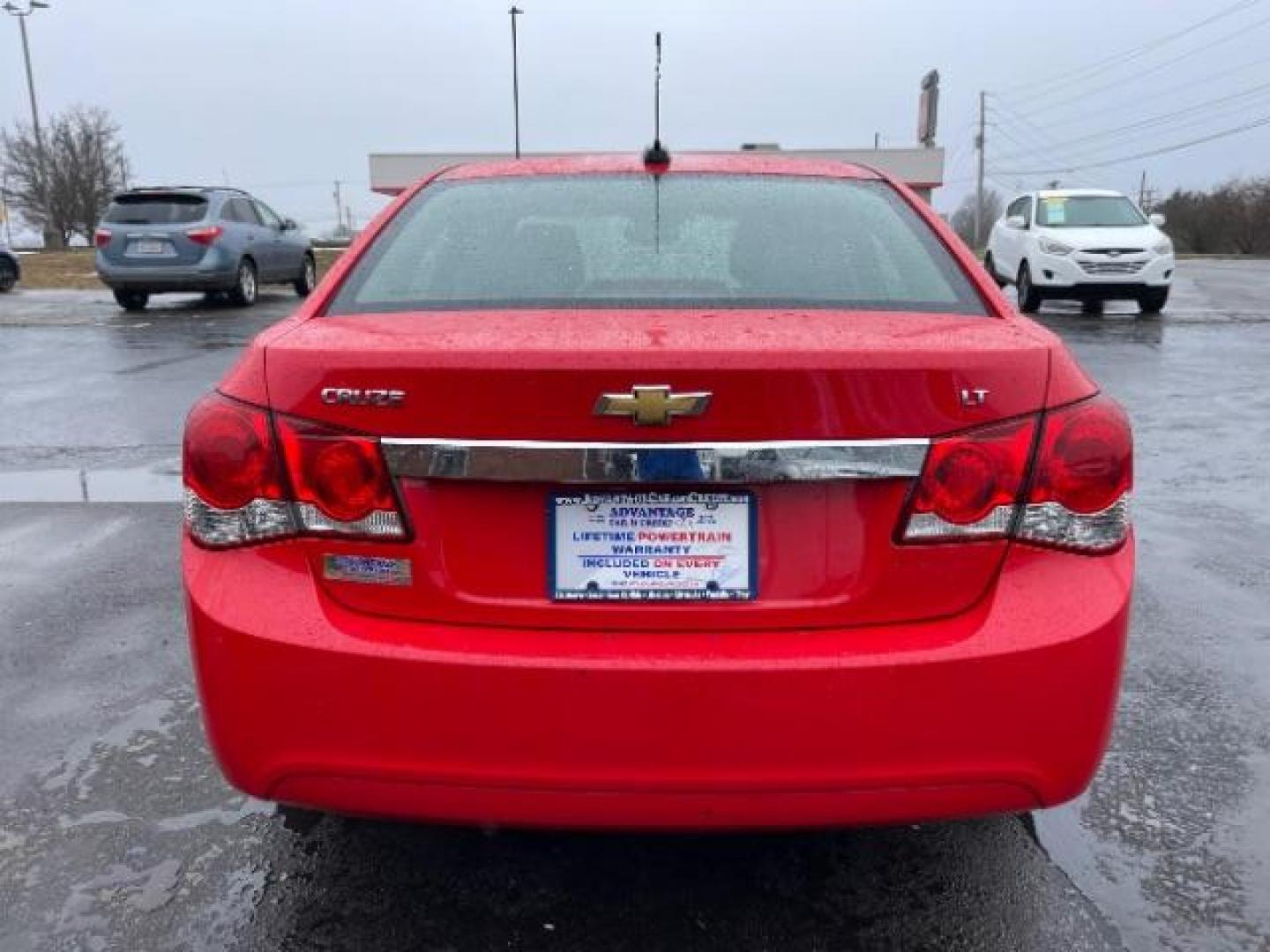 2015 Red Hot Chevrolet Cruze 1LT Auto (1G1PC5SB5F7) with an 1.4L L4 DOHC 16V TURBO engine, 6-Speed Automatic transmission, located at 1951 S Dayton Lakeview Rd., New Carlisle, OH, 45344, (937) 908-9800, 39.890999, -84.050255 - Photo#4