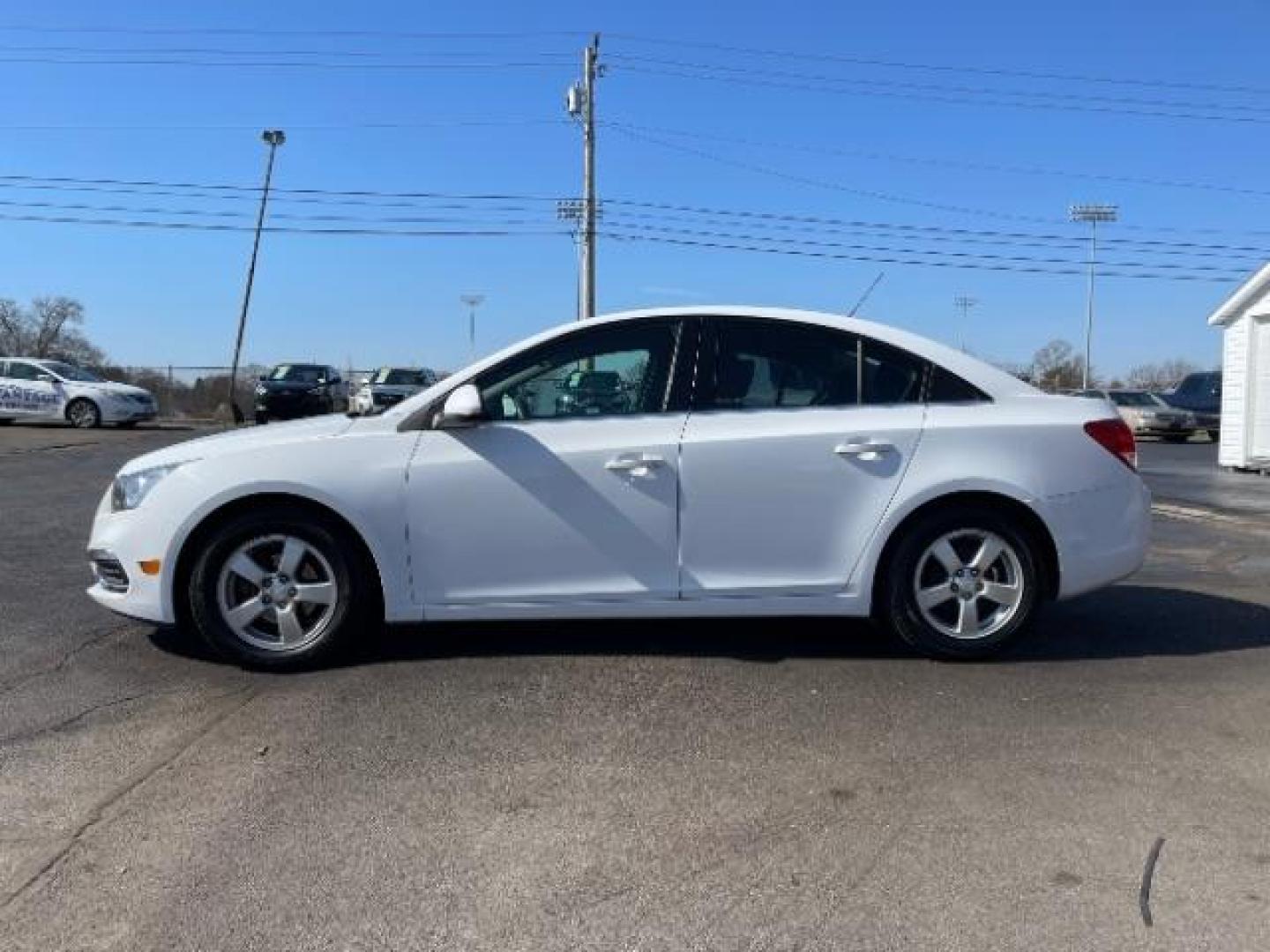 2015 Summit White Chevrolet Cruze 1LT Auto (1G1PC5SB0F7) with an 1.4L L4 DOHC 16V TURBO engine, 6-Speed Automatic transmission, located at 1099 N County Rd 25A, OH, 45373, (937) 908-9800, 40.057079, -84.212883 - Photo#2