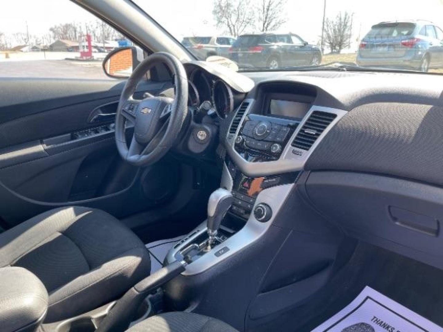 2015 Summit White Chevrolet Cruze 1LT Auto (1G1PC5SB0F7) with an 1.4L L4 DOHC 16V TURBO engine, 6-Speed Automatic transmission, located at 1099 N County Rd 25A, OH, 45373, (937) 908-9800, 40.057079, -84.212883 - Photo#8