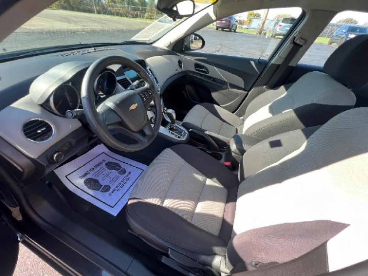 2015 Black Granite Metallic Chevrolet Cruze LS Auto (1G1PA5SHXF7) with an 1.8L L4 DOHC 16V FFV engine, 6-Speed Automatic transmission, located at 4508 South Dixie Dr, Moraine, OH, 45439, (937) 908-9800, 39.690136, -84.216438 - Photo#6