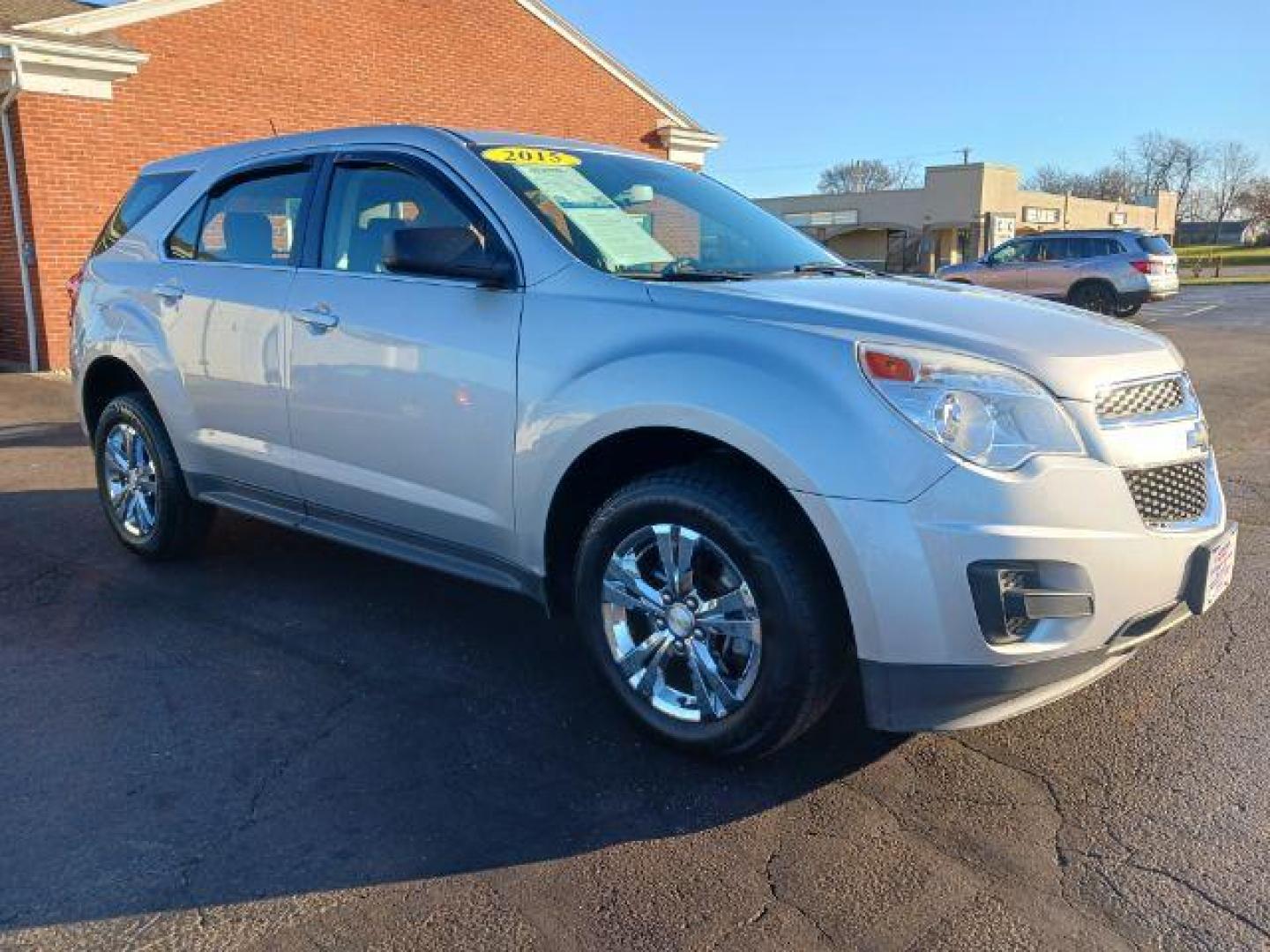 2015 Champagne Silver Metallic Chevrolet Equinox LS AWD (2GNFLEEK6F6) with an 2.4L L4 DOHC 16V FFV engine, 6-Speed Automatic transmission, located at 1951 S Dayton Lakeview Rd., New Carlisle, OH, 45344, (937) 908-9800, 39.890999, -84.050255 - Photo#0