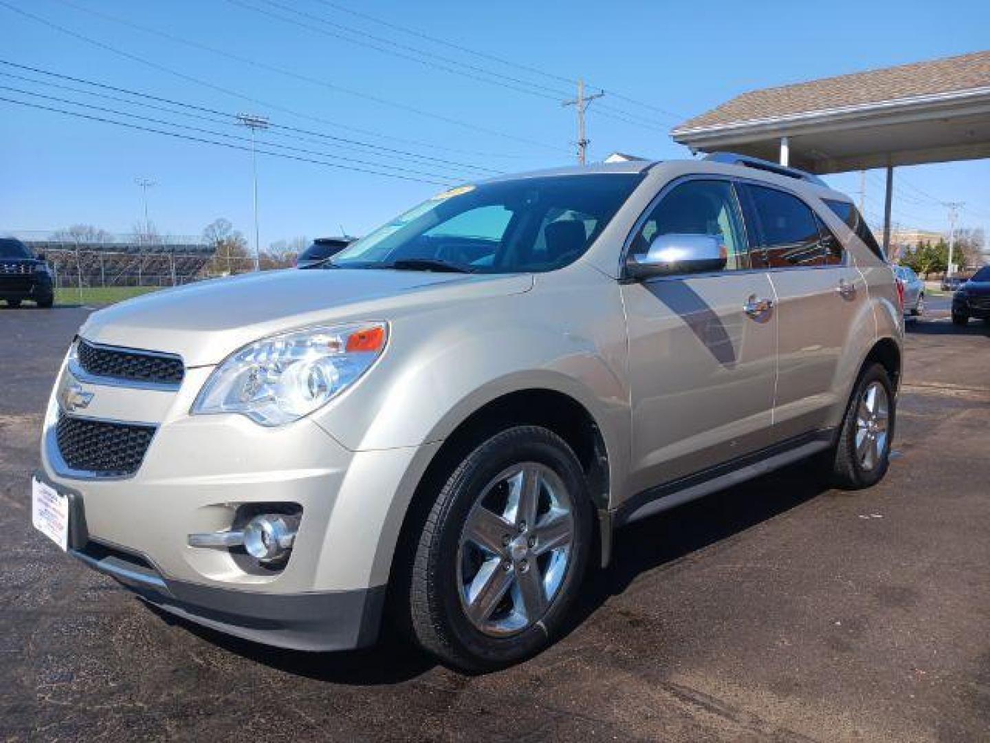 2015 Champagne Silver Metallic Chevrolet Equinox LTZ AWD (2GNFLHEK8F6) with an 2.4L L4 DOHC 16V FFV engine, 6-Speed Automatic transmission, located at 880 E. National Road, Vandalia, OH, 45377, (937) 908-9800, 39.892189, -84.181015 - Photo#2