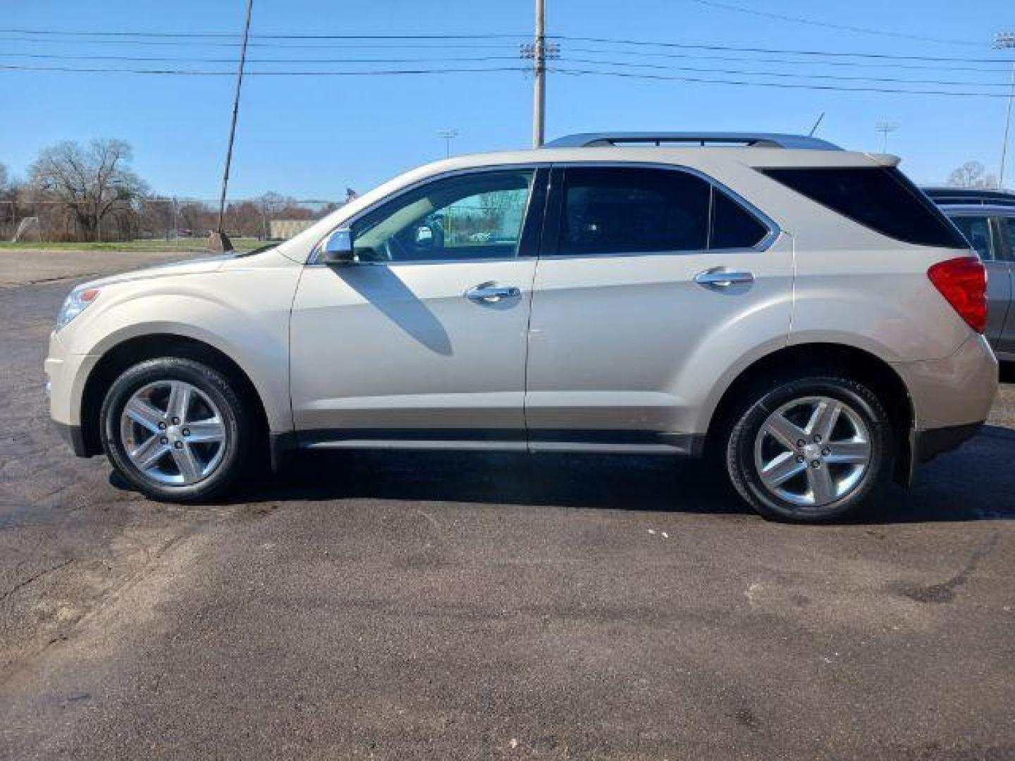 2015 Champagne Silver Metallic Chevrolet Equinox LTZ AWD (2GNFLHEK8F6) with an 2.4L L4 DOHC 16V FFV engine, 6-Speed Automatic transmission, located at 880 E. National Road, Vandalia, OH, 45377, (937) 908-9800, 39.892189, -84.181015 - Photo#3