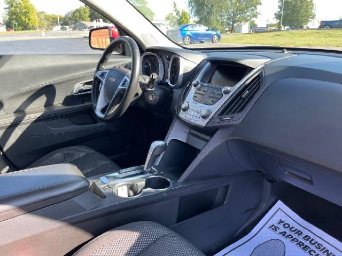 2015 Crystal Red Tintcoat Chevrolet Equinox 1LT 2WD (2GNALBEK3F1) with an 2.4L L4 DOHC 16V FFV engine, 6-Speed Automatic transmission, located at 880 E. National Road, Vandalia, OH, 45377, (937) 908-9800, 39.892189, -84.181015 - Photo#11