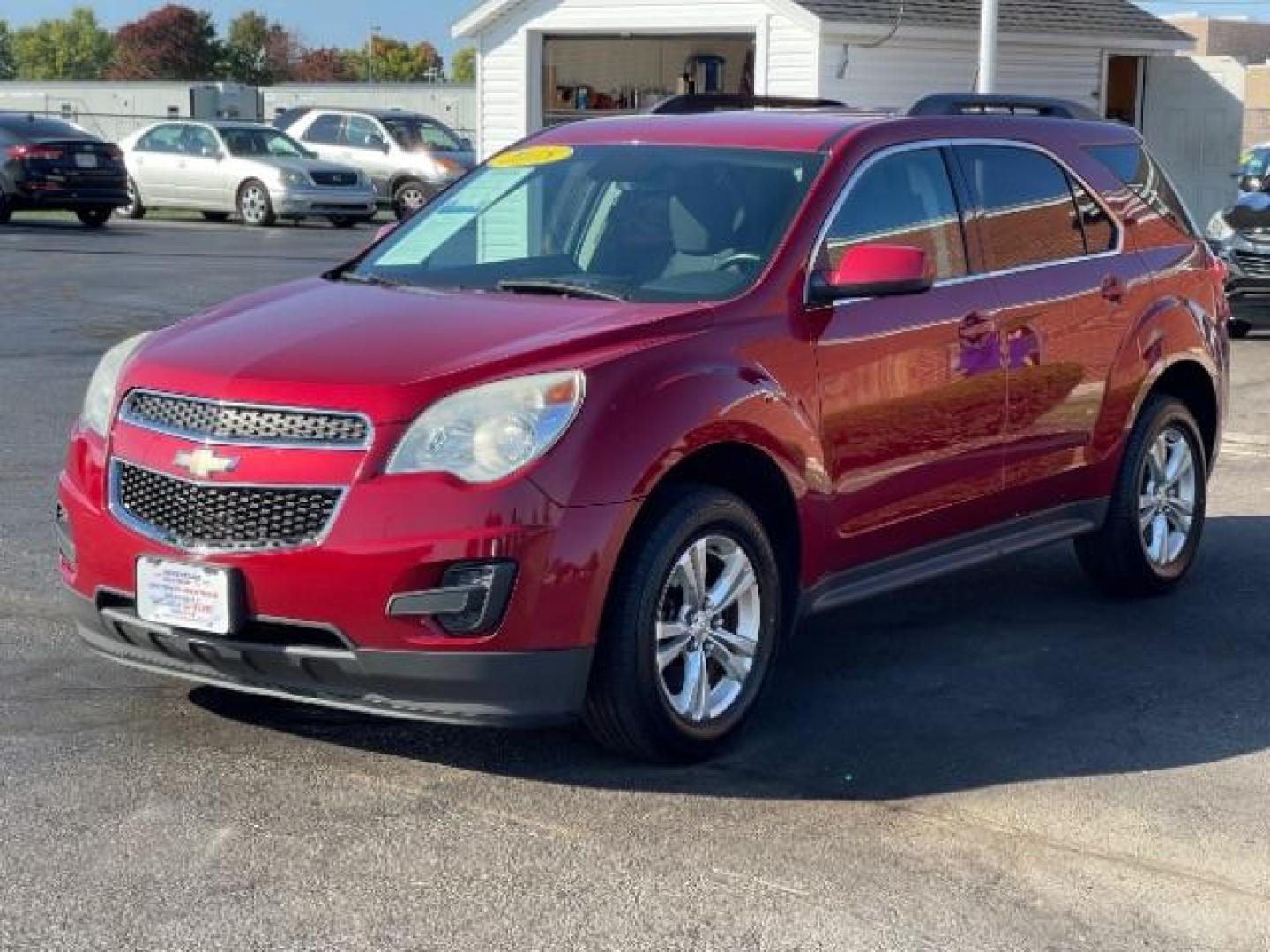 2015 Crystal Red Tintcoat Chevrolet Equinox 1LT 2WD (2GNALBEK3F1) with an 2.4L L4 DOHC 16V FFV engine, 6-Speed Automatic transmission, located at 880 E. National Road, Vandalia, OH, 45377, (937) 908-9800, 39.892189, -84.181015 - Photo#2