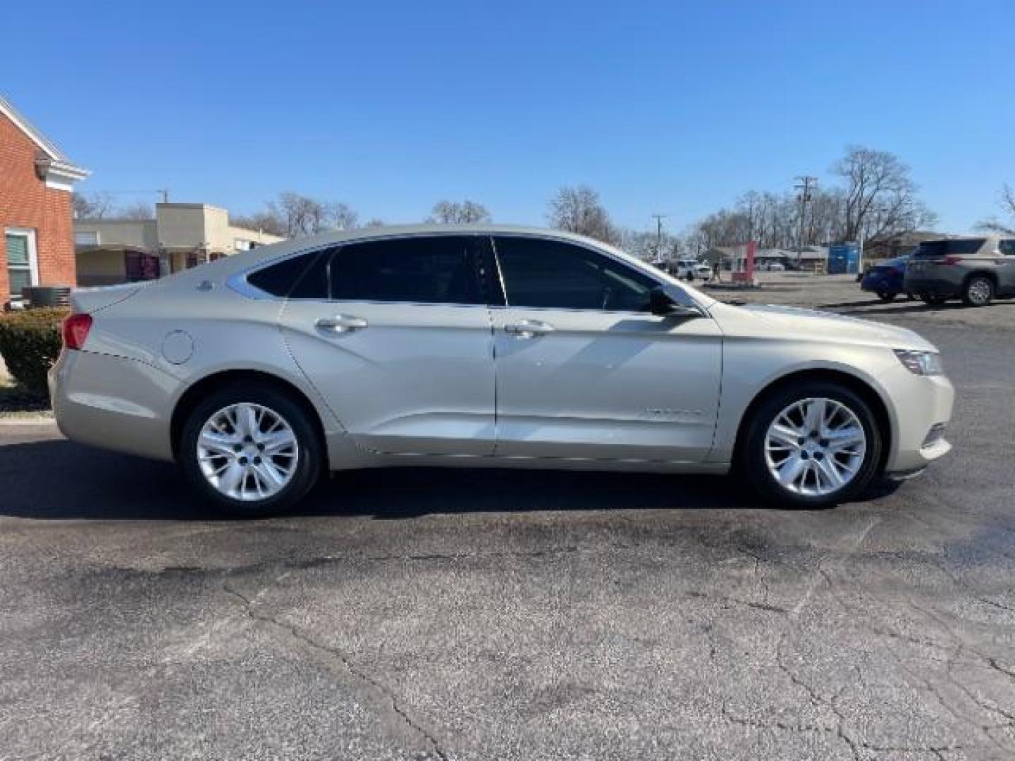 2015 Champagne Silver Metallic Chevrolet Impala LS (2G11Z5SL2F9) with an 2.5L L4 DOHC 16V engine, 6-Speed Automatic transmission, located at 1951 S Dayton Lakeview Rd., New Carlisle, OH, 45344, (937) 908-9800, 39.890999, -84.050255 - Photo#3