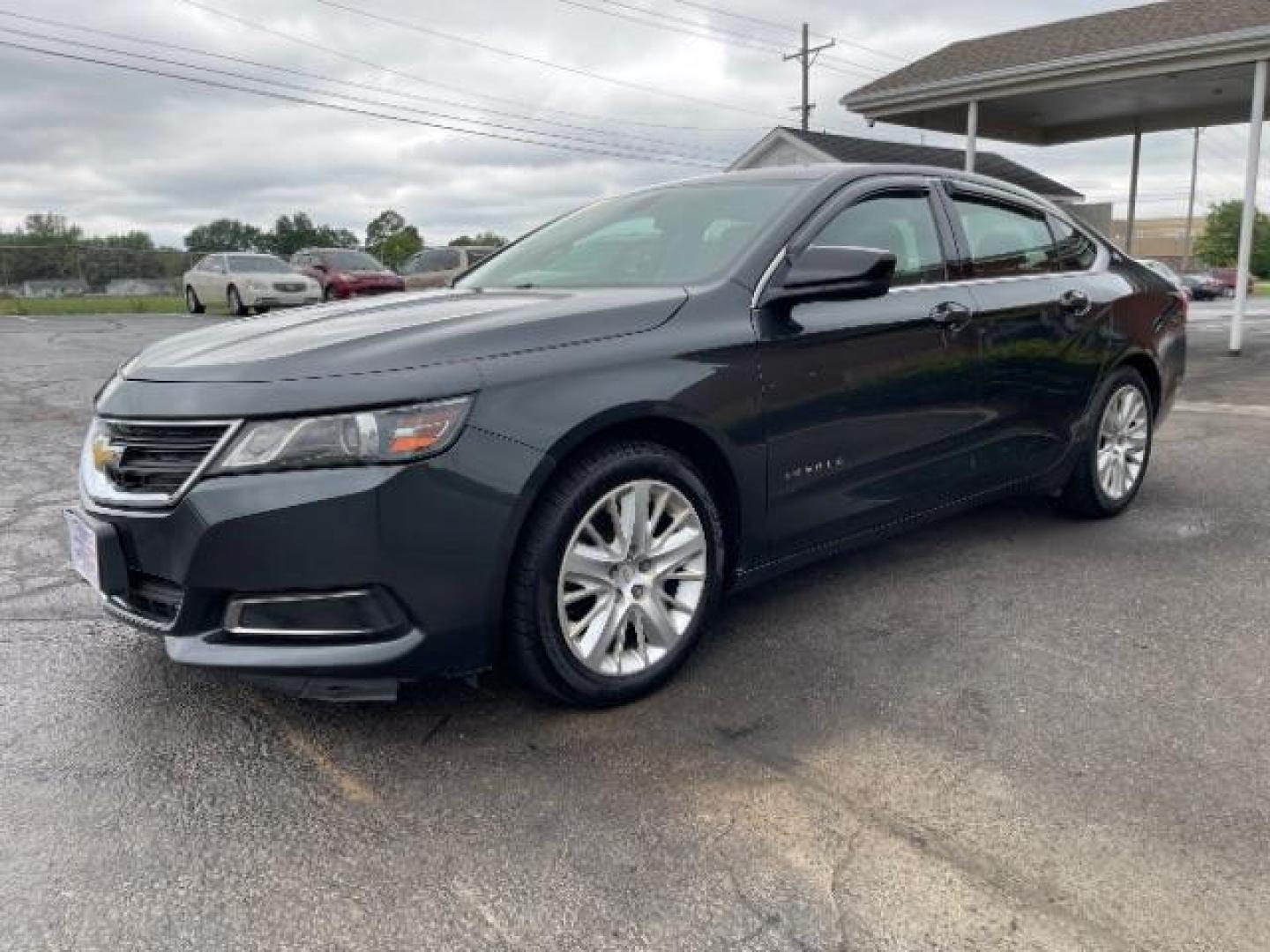 2015 Black Chevrolet Impala LS (2G11Z5SL6F9) with an 2.5L L4 DOHC 16V engine, 6-Speed Automatic transmission, located at 1184 Kauffman Ave, Fairborn, OH, 45324, (937) 908-9800, 39.807365, -84.029114 - Photo#1