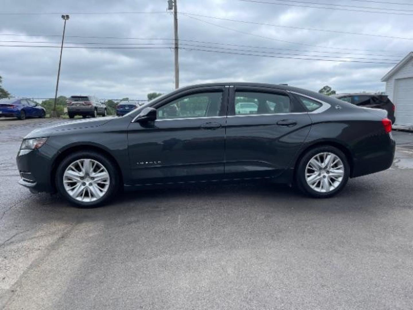 2015 Black Chevrolet Impala LS (2G11Z5SL6F9) with an 2.5L L4 DOHC 16V engine, 6-Speed Automatic transmission, located at 1184 Kauffman Ave, Fairborn, OH, 45324, (937) 908-9800, 39.807365, -84.029114 - Photo#2