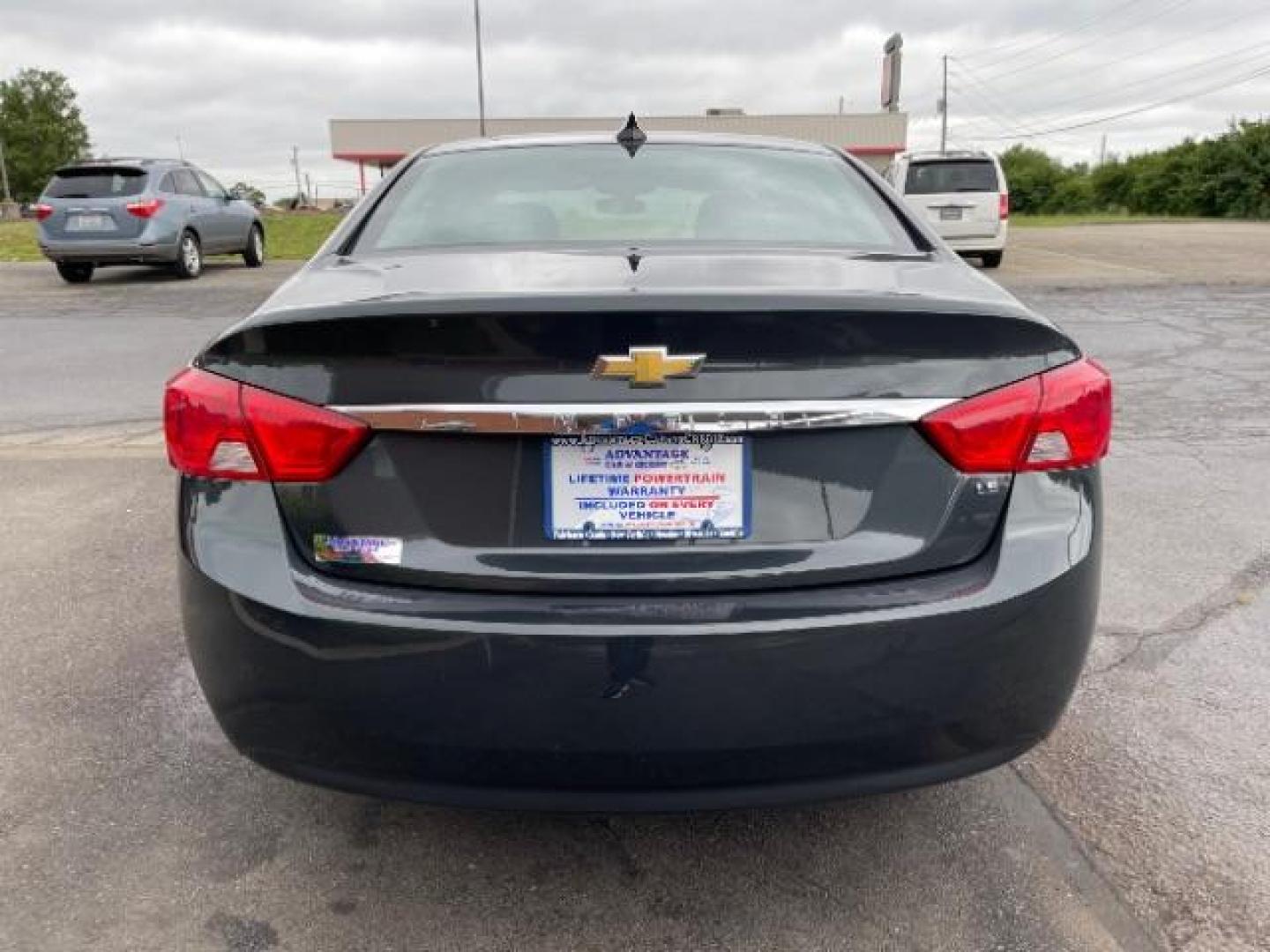 2015 Black Chevrolet Impala LS (2G11Z5SL6F9) with an 2.5L L4 DOHC 16V engine, 6-Speed Automatic transmission, located at 1184 Kauffman Ave, Fairborn, OH, 45324, (937) 908-9800, 39.807365, -84.029114 - Photo#4