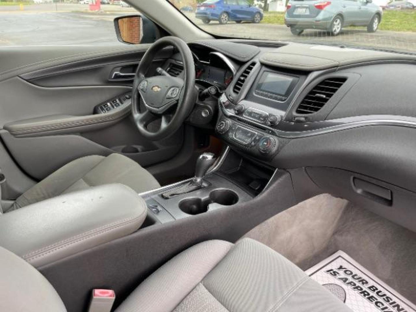 2015 Black Chevrolet Impala LS (2G11Z5SL6F9) with an 2.5L L4 DOHC 16V engine, 6-Speed Automatic transmission, located at 1184 Kauffman Ave, Fairborn, OH, 45324, (937) 908-9800, 39.807365, -84.029114 - Photo#8