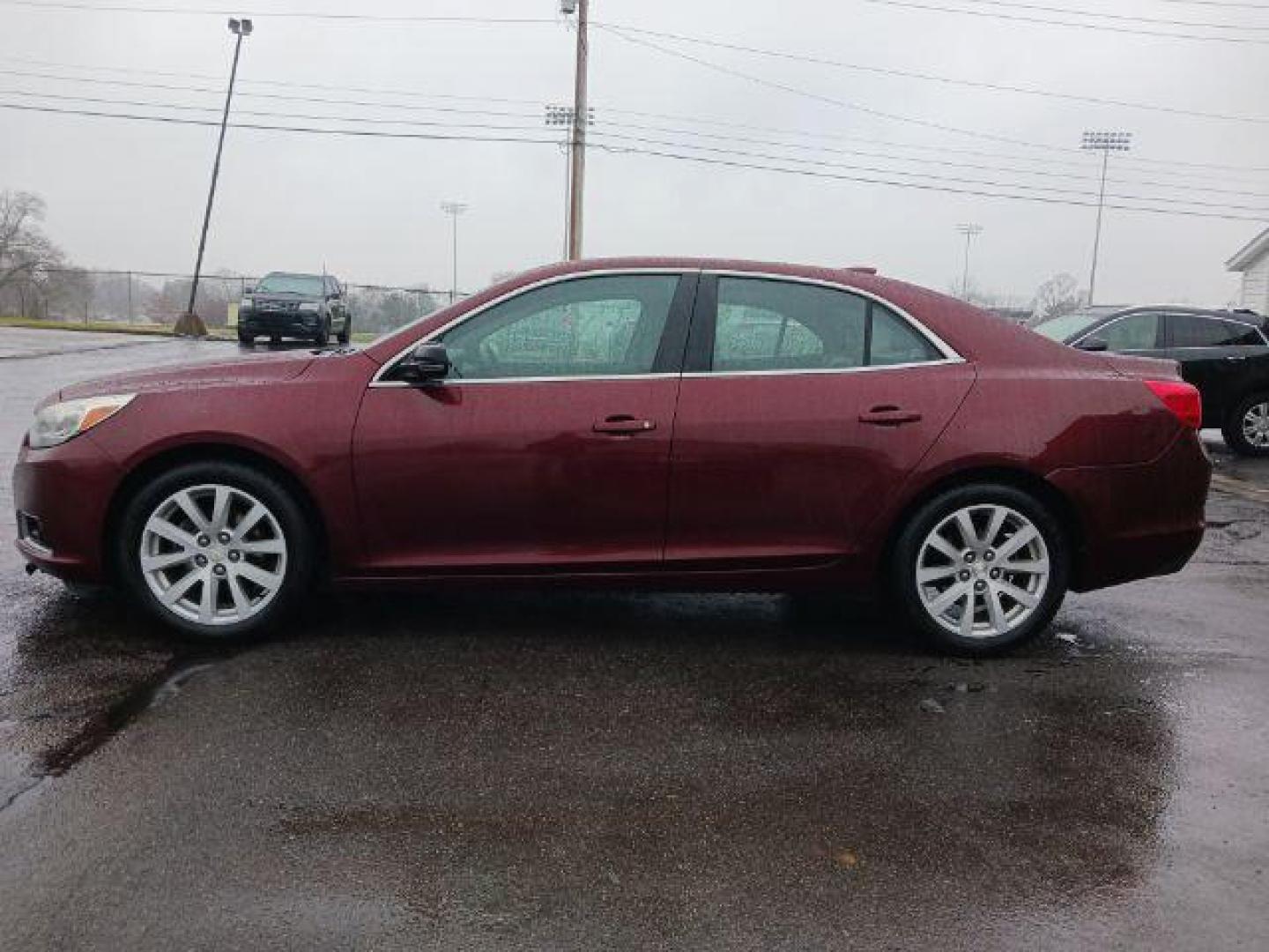 2015 Butte Red Metallic Chevrolet Malibu 2LT (1G11D5SL6FF) with an 2.5L L4 DOHC 16V engine, 6-Speed Automatic transmission, located at 401 Woodman Dr, Riverside, OH, 45431, (937) 908-9800, 39.763779, -84.122063 - Photo#3