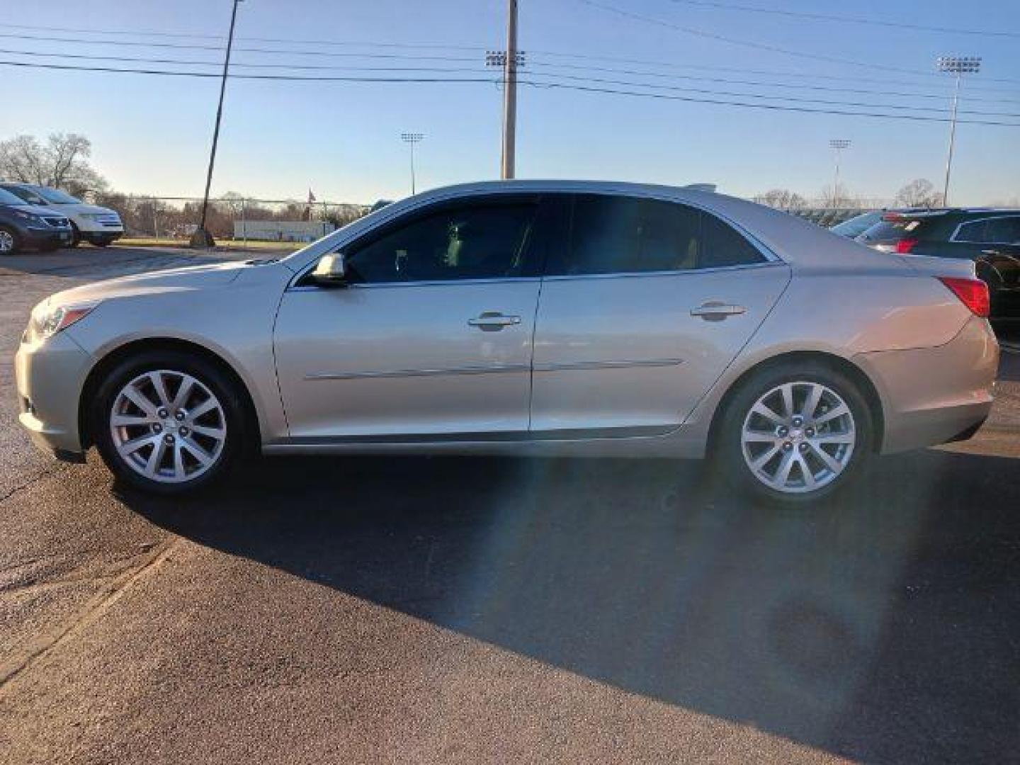 2015 Champagne Silver Metallic Chevrolet Malibu 2LT (1G11D5SL2FF) with an 2.5L L4 DOHC 16V engine, 6-Speed Automatic transmission, located at 1230 East Main St, Xenia, OH, 45385, (937) 908-9800, 39.687321, -83.910294 - Photo#3