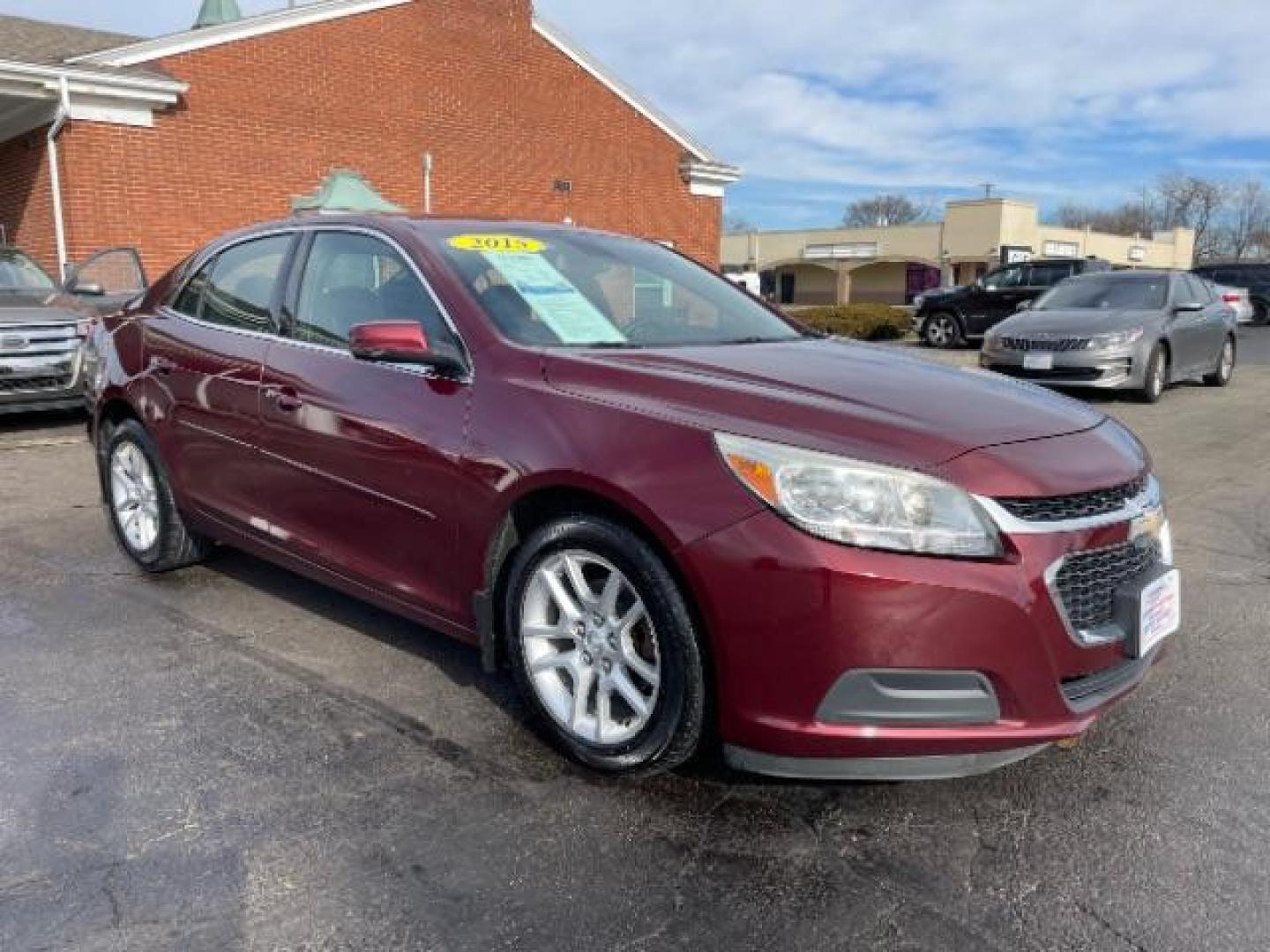 2015 Butte Red Metallic Chevrolet Malibu 1LT (1G11C5SL6FF) with an 2.5L L4 DOHC 16V engine, 6-Speed Automatic transmission, located at 1230 East Main St, Xenia, OH, 45385, (937) 908-9800, 39.687321, -83.910294 - Photo#0