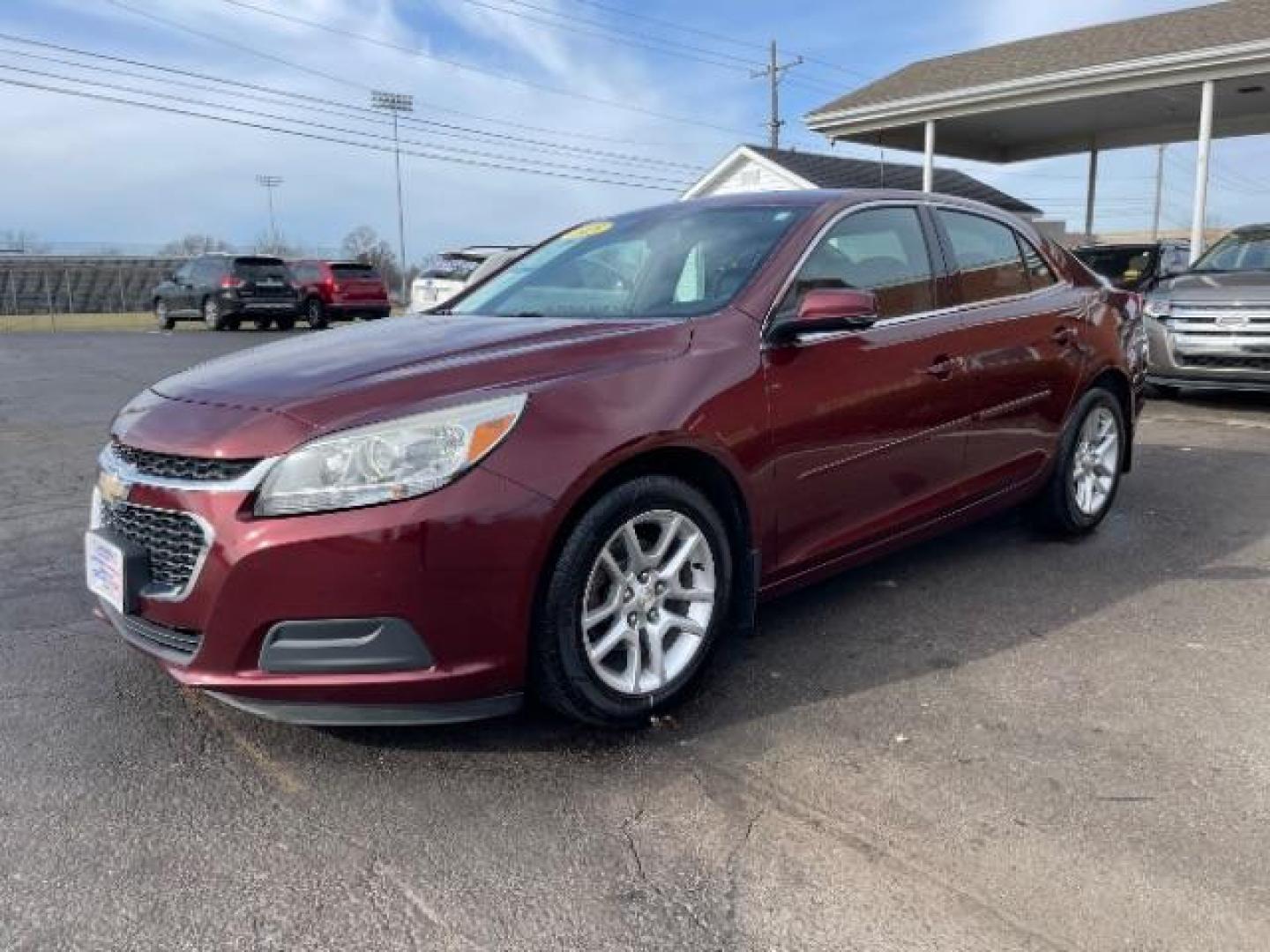 2015 Butte Red Metallic Chevrolet Malibu 1LT (1G11C5SL6FF) with an 2.5L L4 DOHC 16V engine, 6-Speed Automatic transmission, located at 1230 East Main St, Xenia, OH, 45385, (937) 908-9800, 39.687321, -83.910294 - Photo#1