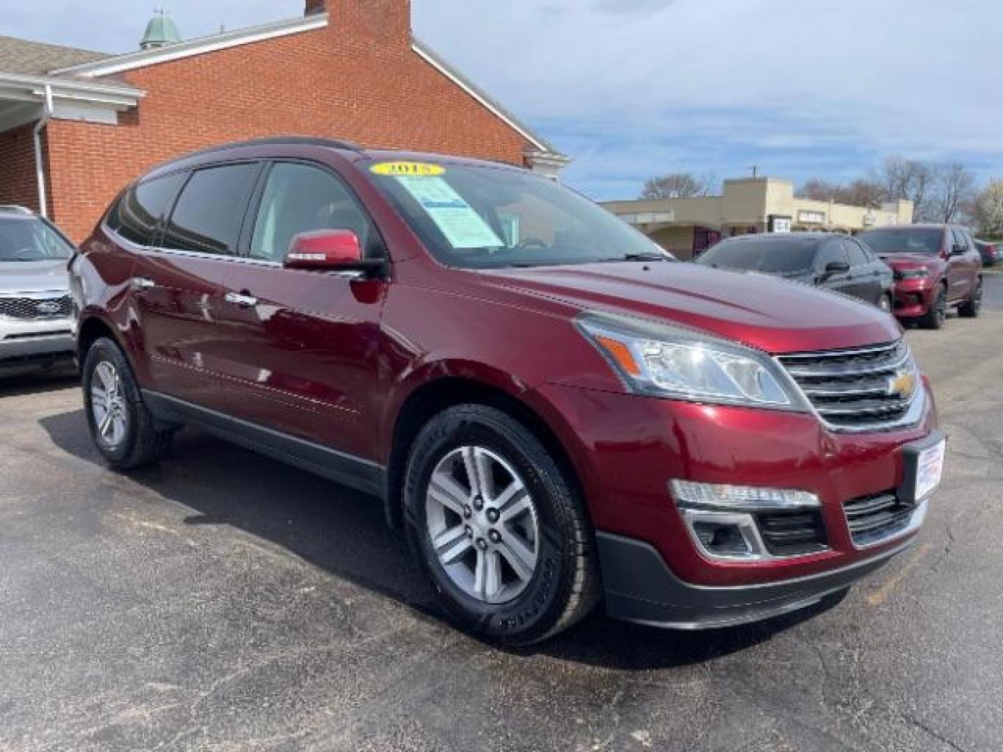 2015 Siren Red Tintcoat Chevrolet Traverse 2LT AWD (1GNKVHKD7FJ) with an 3.6L V6 DOHC 24V engine, 6-Speed Automatic transmission, located at 1184 Kauffman Ave, Fairborn, OH, 45324, (937) 908-9800, 39.807365, -84.029114 - Photo#0