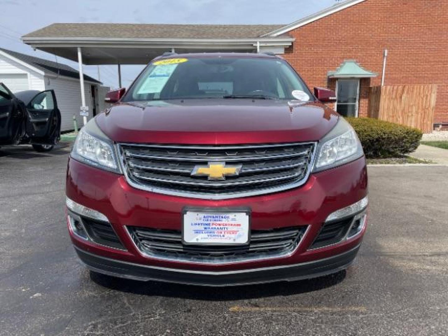 2015 Siren Red Tintcoat Chevrolet Traverse 2LT AWD (1GNKVHKD7FJ) with an 3.6L V6 DOHC 24V engine, 6-Speed Automatic transmission, located at 1184 Kauffman Ave, Fairborn, OH, 45324, (937) 908-9800, 39.807365, -84.029114 - Photo#2