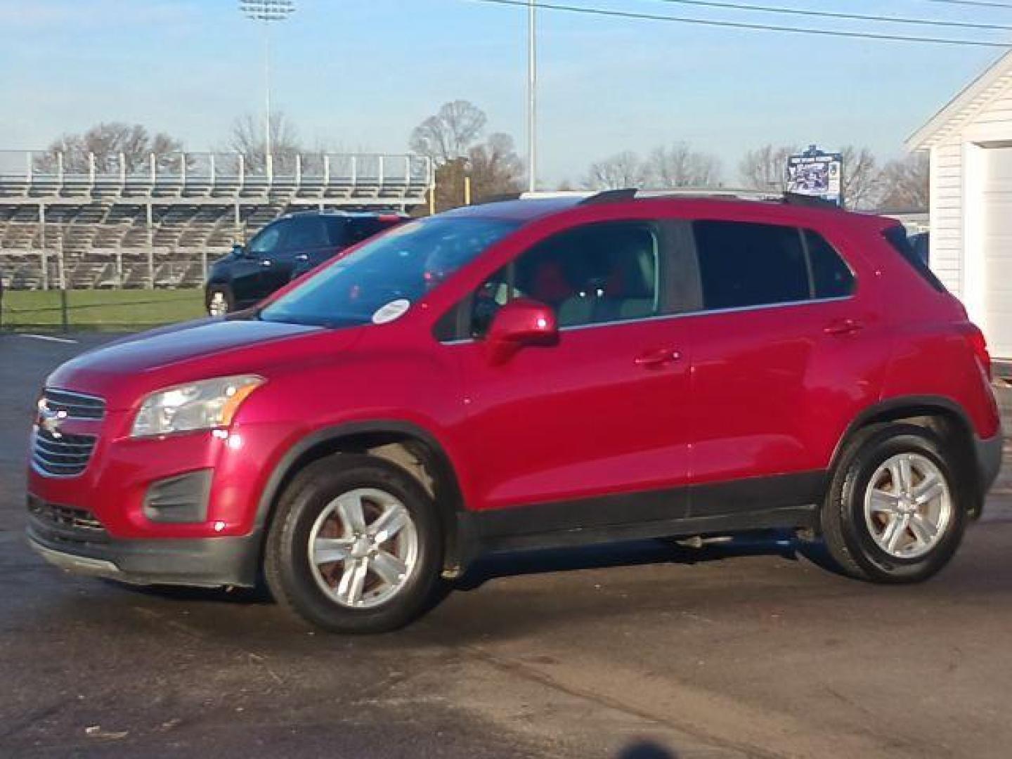 2015 Blaze Red Chevrolet Trax LT AWD (KL7CJRSB6FB) with an 1.4L L4 DOHC 16V engine, 6-Speed Automatic transmission, located at 4508 South Dixie Dr, Moraine, OH, 45439, (937) 908-9800, 39.690136, -84.216438 - Photo#2