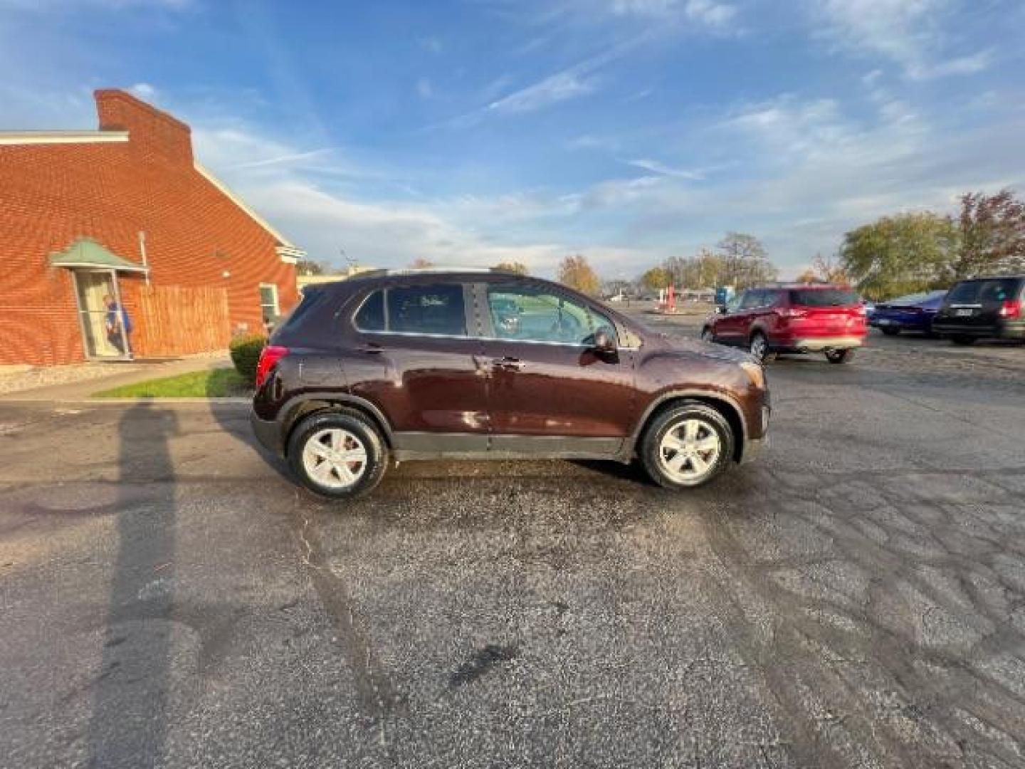 2015 Deep Espresso Metallic Chevrolet Trax LT FWD (KL7CJLSB0FB) with an 1.4L L4 DOHC 16V engine, 6-Speed Automatic transmission, located at 4508 South Dixie Dr, Moraine, OH, 45439, (937) 908-9800, 39.690136, -84.216438 - Photo#4