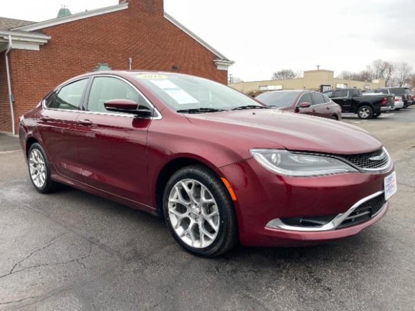 2015 Velvet Red Pearlcoat Chrysler 200 C AWD (1C3CCCEG1FN) with an 3.6L V6 DOHC 24V FFV engine, 9-Speed Automatic transmission, located at 880 E. National Road, Vandalia, OH, 45377, (937) 908-9800, 39.892189, -84.181015 - Photo#0