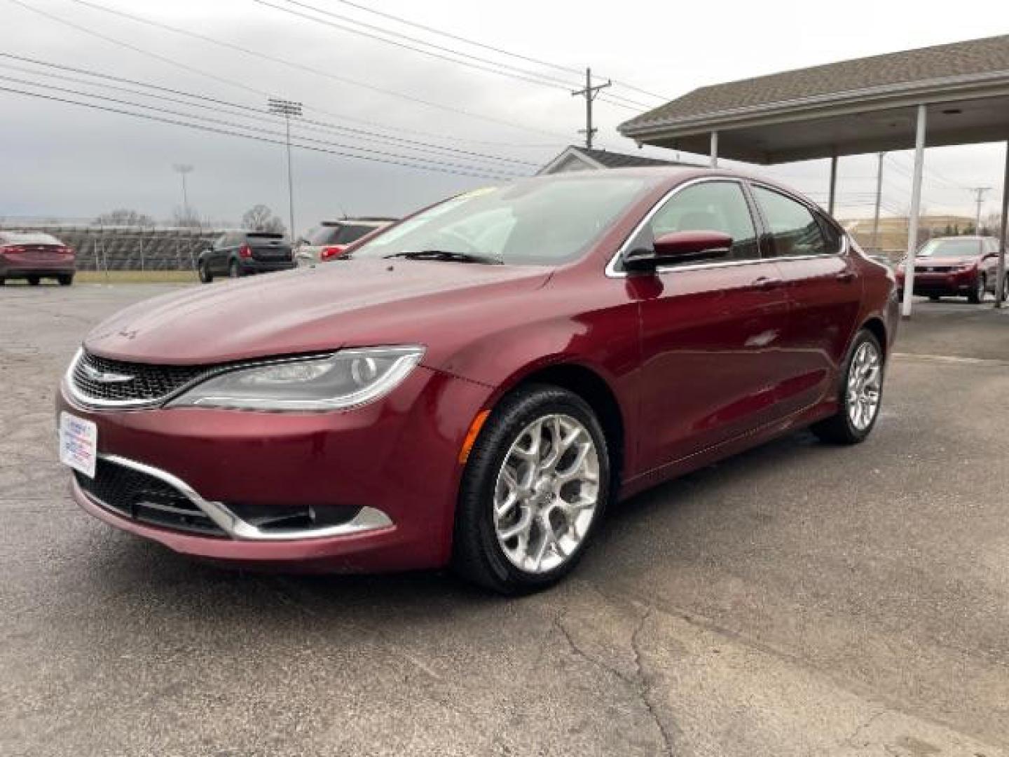 2015 Velvet Red Pearlcoat Chrysler 200 C AWD (1C3CCCEG1FN) with an 3.6L V6 DOHC 24V FFV engine, 9-Speed Automatic transmission, located at 880 E. National Road, Vandalia, OH, 45377, (937) 908-9800, 39.892189, -84.181015 - Photo#1