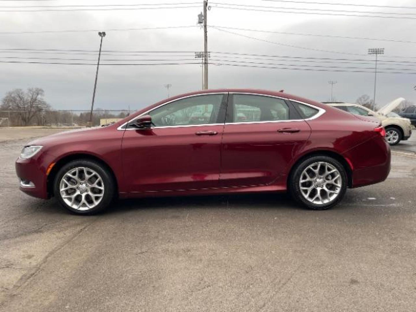 2015 Velvet Red Pearlcoat Chrysler 200 C AWD (1C3CCCEG1FN) with an 3.6L V6 DOHC 24V FFV engine, 9-Speed Automatic transmission, located at 880 E. National Road, Vandalia, OH, 45377, (937) 908-9800, 39.892189, -84.181015 - Photo#2