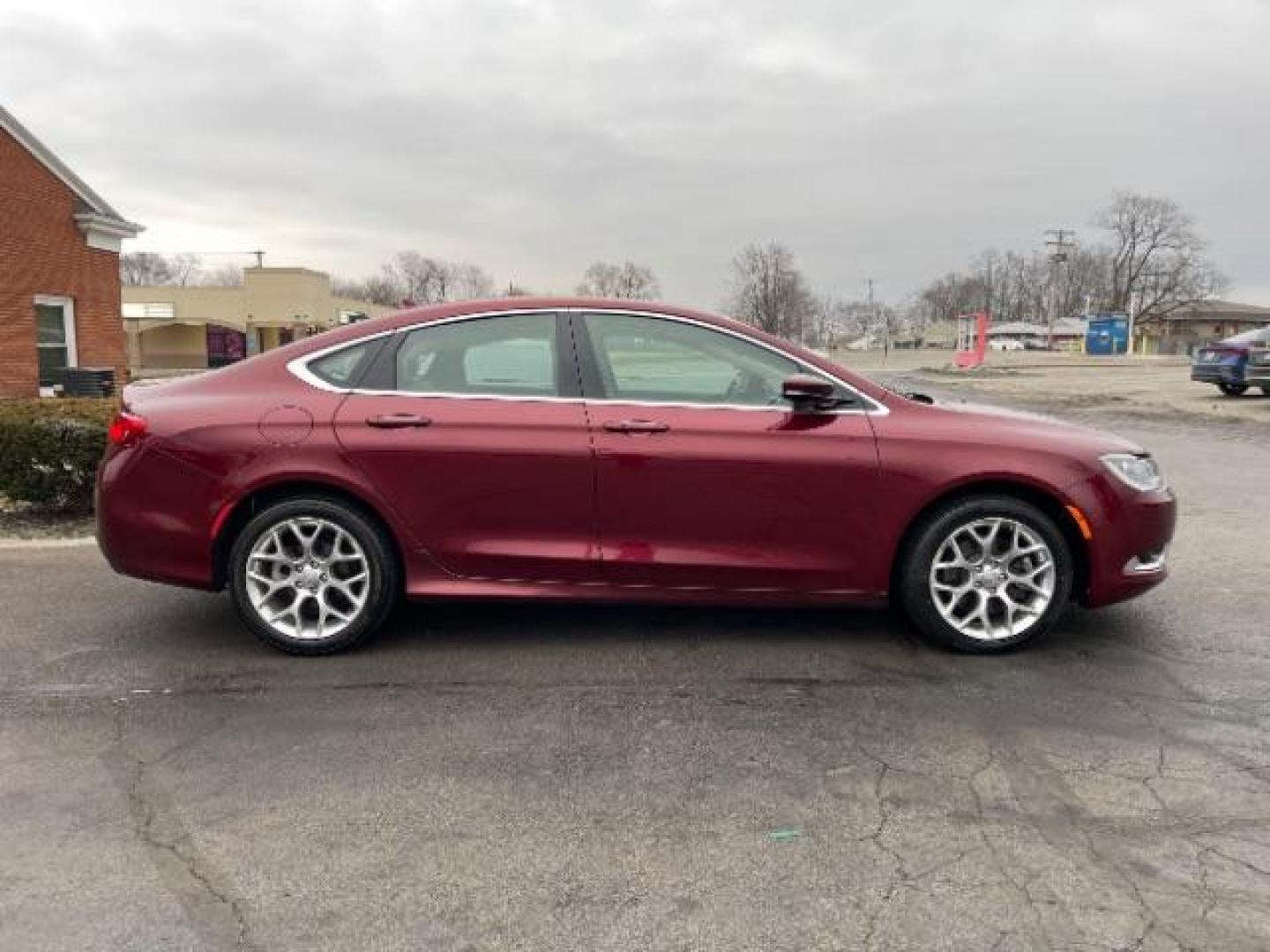 2015 Velvet Red Pearlcoat Chrysler 200 C AWD (1C3CCCEG1FN) with an 3.6L V6 DOHC 24V FFV engine, 9-Speed Automatic transmission, located at 880 E. National Road, Vandalia, OH, 45377, (937) 908-9800, 39.892189, -84.181015 - Photo#3