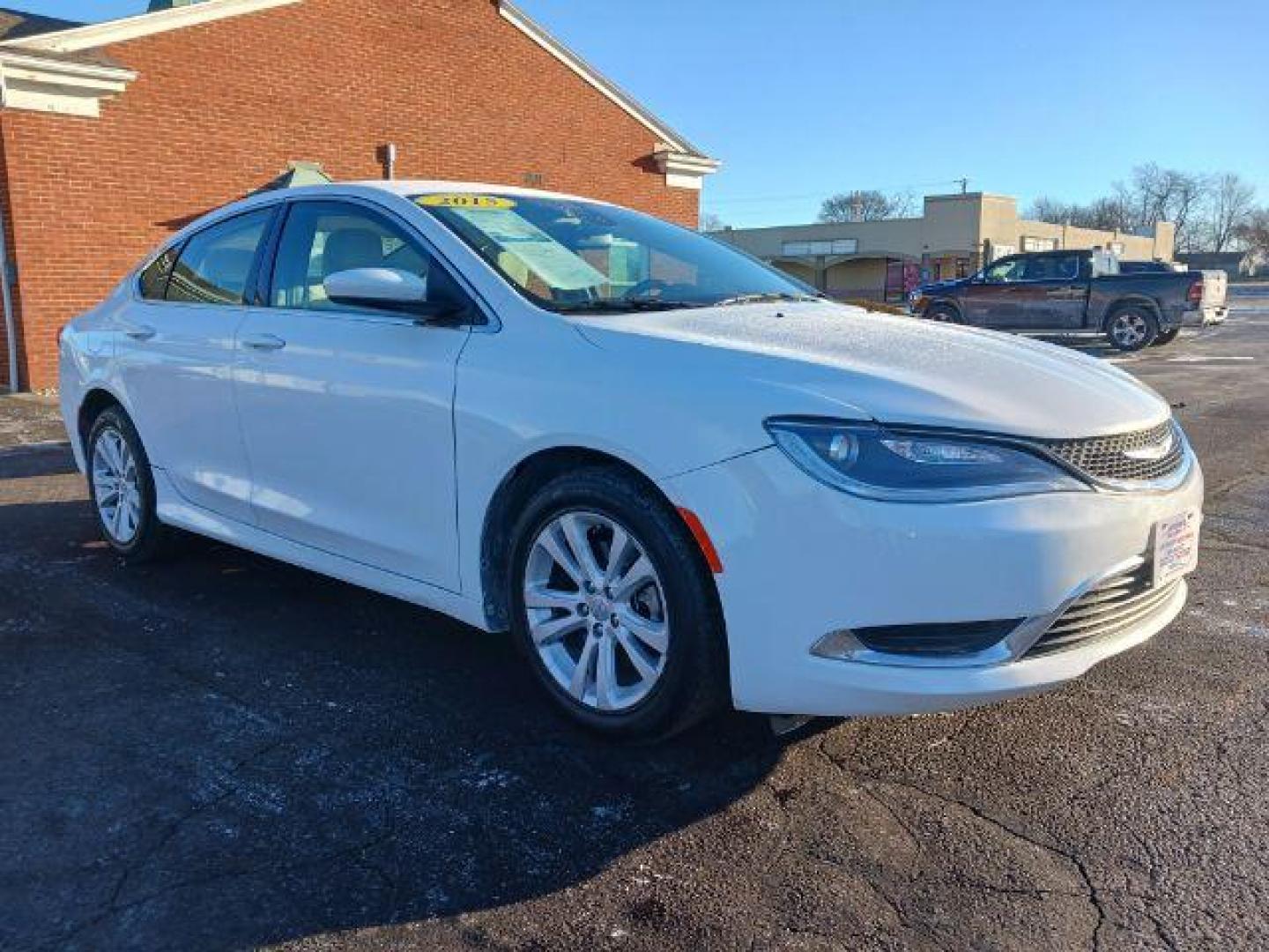 2015 Lunar White Tri-Coat Chrysler 200 Limited (1C3CCCAB9FN) with an 2.4L L4 DOHC 16V engine, 9-Speed Automatic transmission, located at 1099 N County Rd 25A, OH, 45373, (937) 908-9800, 40.057079, -84.212883 - Photo#0