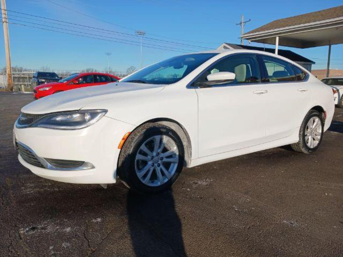 2015 Lunar White Tri-Coat Chrysler 200 Limited (1C3CCCAB9FN) with an 2.4L L4 DOHC 16V engine, 9-Speed Automatic transmission, located at 1099 N County Rd 25A, OH, 45373, (937) 908-9800, 40.057079, -84.212883 - Photo#2