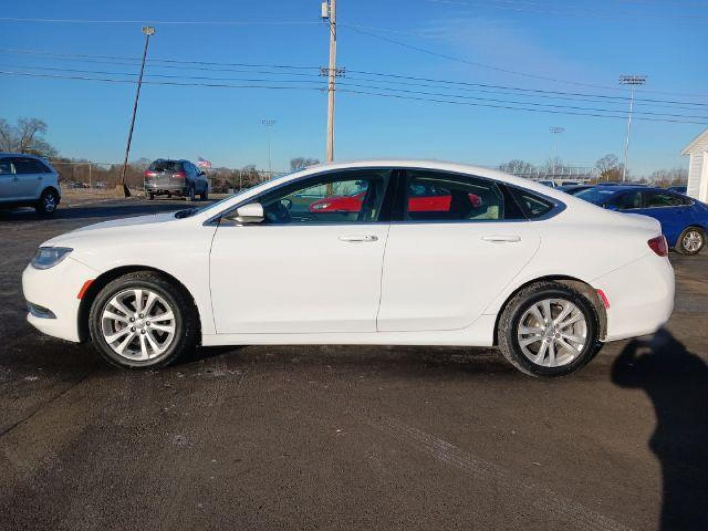 2015 Lunar White Tri-Coat Chrysler 200 Limited (1C3CCCAB9FN) with an 2.4L L4 DOHC 16V engine, 9-Speed Automatic transmission, located at 1099 N County Rd 25A, OH, 45373, (937) 908-9800, 40.057079, -84.212883 - Photo#3