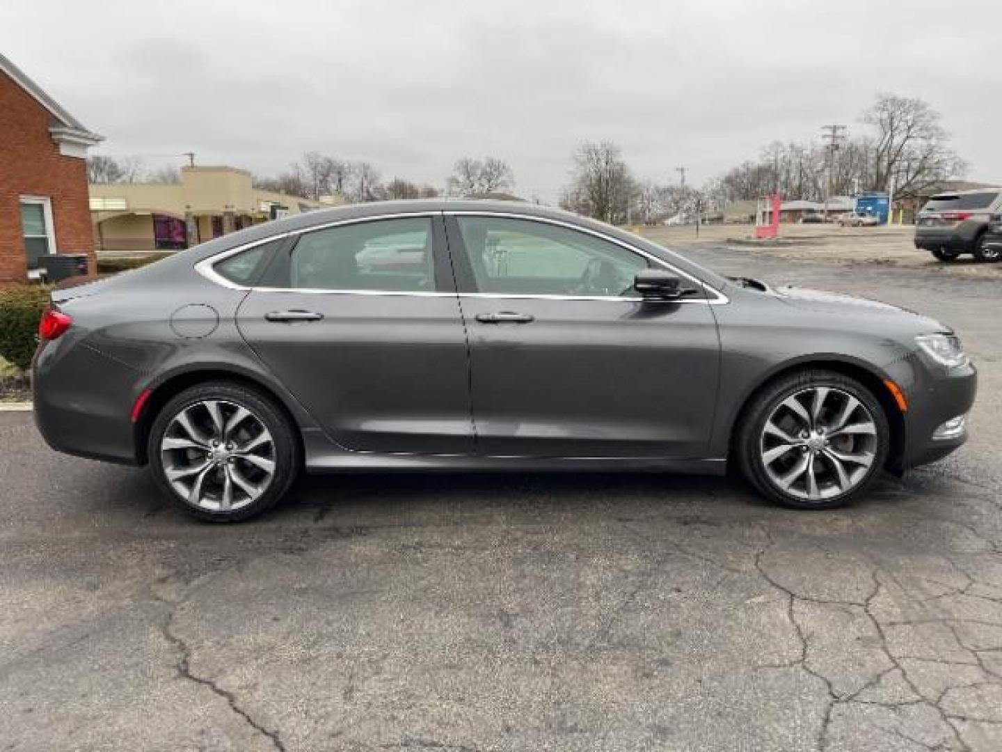 2015 Granite Crystal Met CC Chrysler 200 C AWD (1C3CCCEG2FN) with an 3.6L V6 DOHC 24V FFV engine, 9-Speed Automatic transmission, located at 1099 N County Rd 25A, OH, 45373, (937) 908-9800, 40.057079, -84.212883 - Photo#2