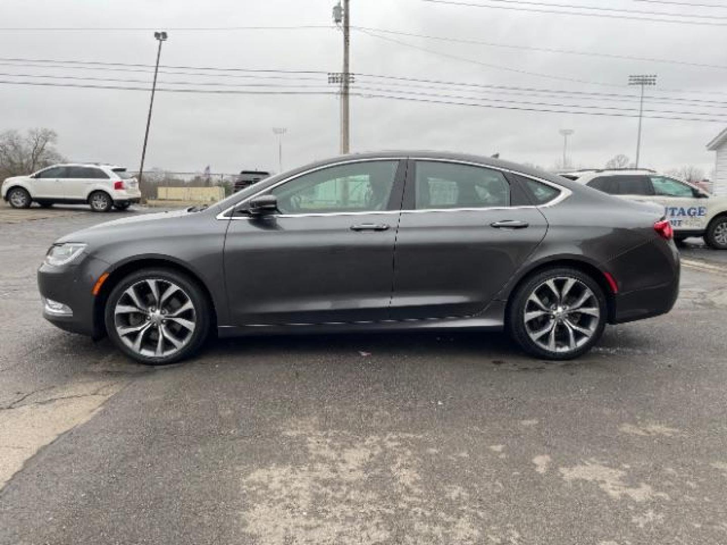 2015 Granite Crystal Met CC Chrysler 200 C AWD (1C3CCCEG2FN) with an 3.6L V6 DOHC 24V FFV engine, 9-Speed Automatic transmission, located at 1099 N County Rd 25A, OH, 45373, (937) 908-9800, 40.057079, -84.212883 - Photo#3