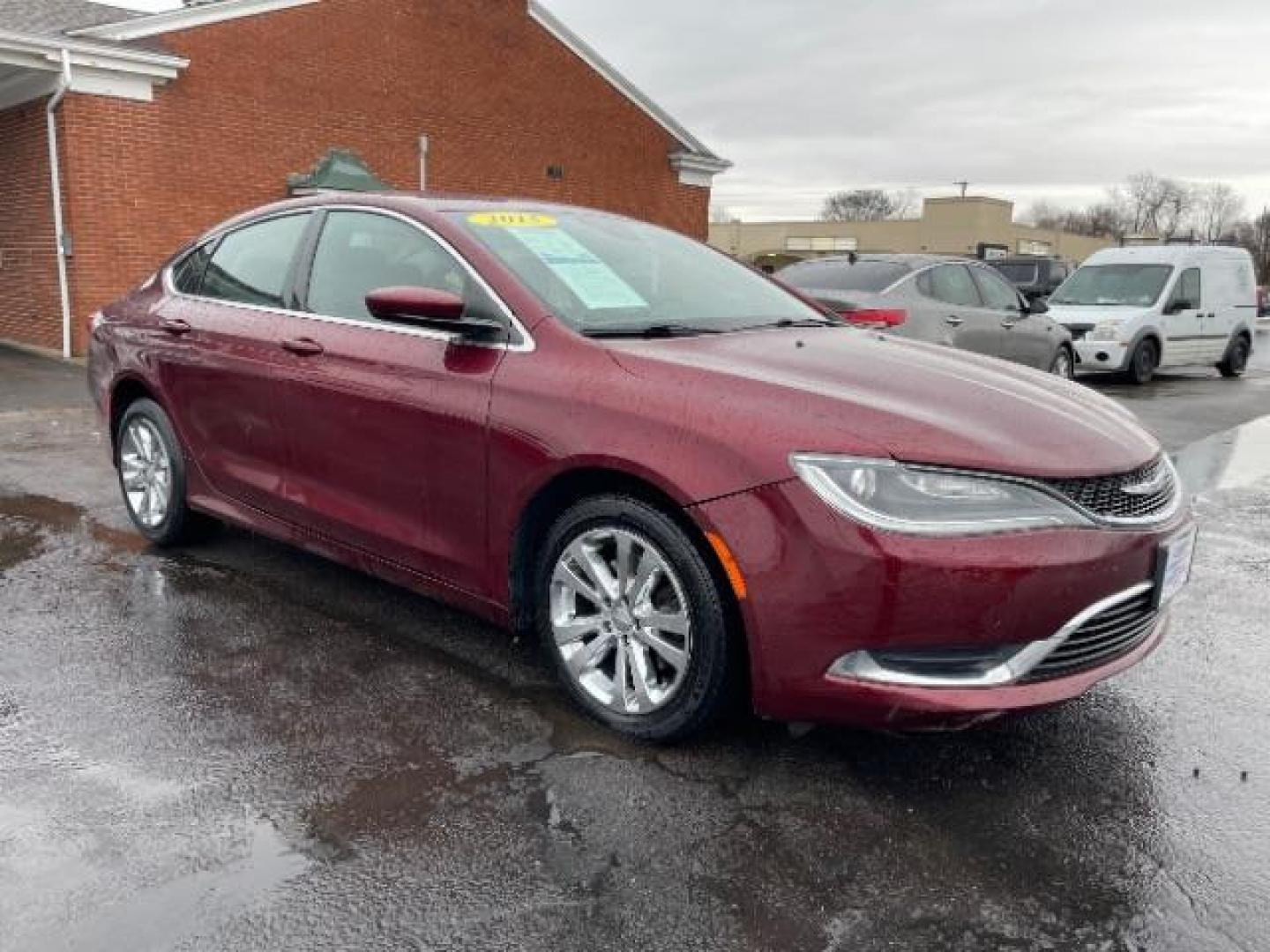 2015 Velvet Red Pearlcoat Chrysler 200 Limited (1C3CCCAB3FN) with an 2.4L L4 DOHC 16V engine, 9-Speed Automatic transmission, located at 401 Woodman Dr, Riverside, OH, 45431, (937) 908-9800, 39.763779, -84.122063 - Photo#0