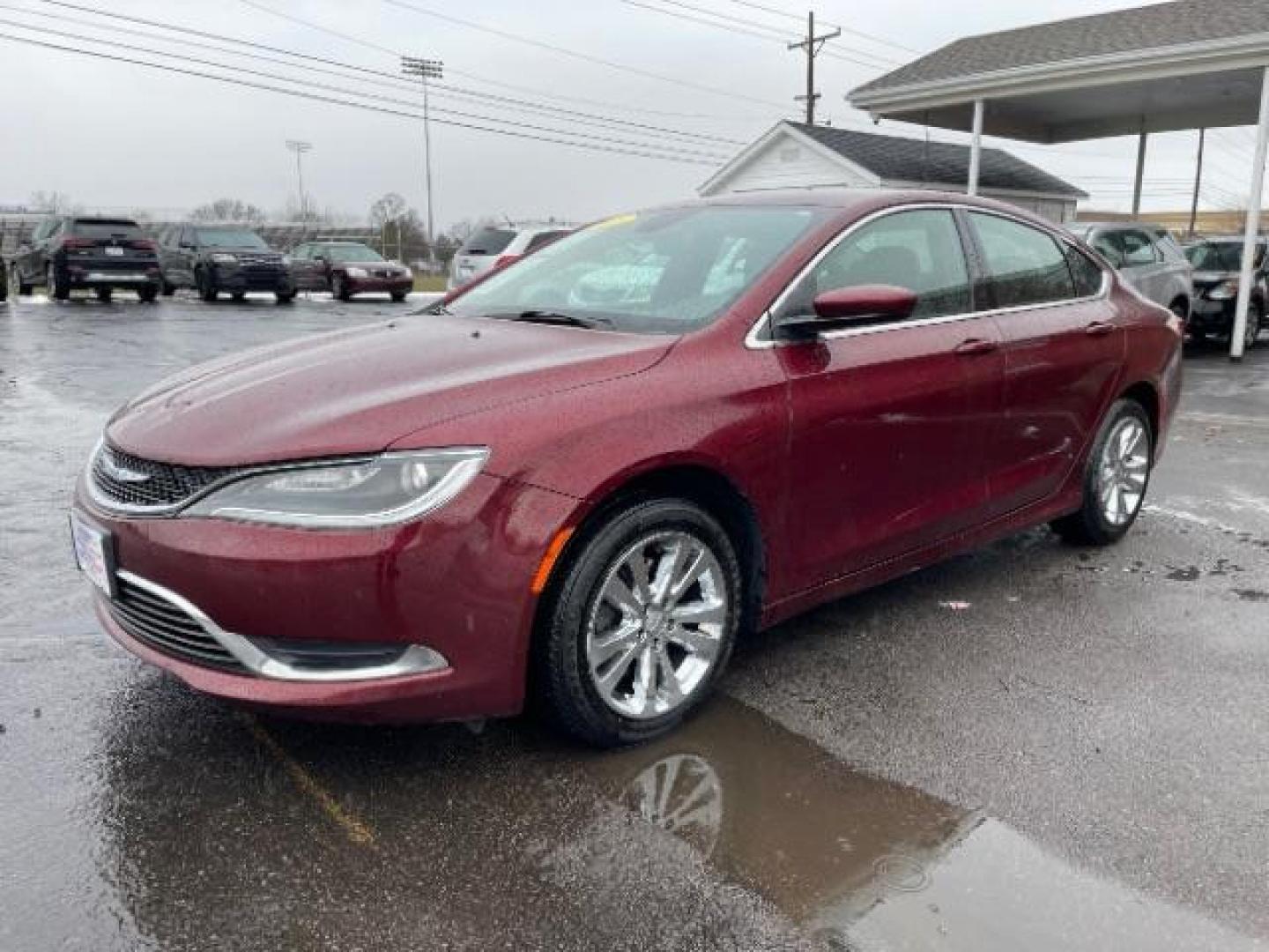 2015 Velvet Red Pearlcoat Chrysler 200 Limited (1C3CCCAB3FN) with an 2.4L L4 DOHC 16V engine, 9-Speed Automatic transmission, located at 401 Woodman Dr, Riverside, OH, 45431, (937) 908-9800, 39.763779, -84.122063 - Photo#1