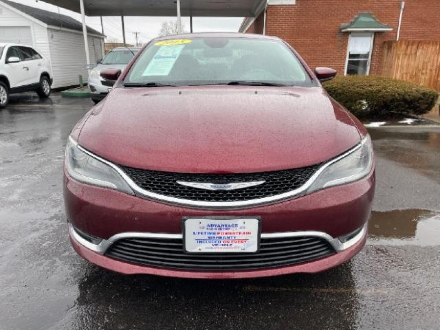 2015 Velvet Red Pearlcoat Chrysler 200 Limited (1C3CCCAB3FN) with an 2.4L L4 DOHC 16V engine, 9-Speed Automatic transmission, located at 401 Woodman Dr, Riverside, OH, 45431, (937) 908-9800, 39.763779, -84.122063 - Photo#2