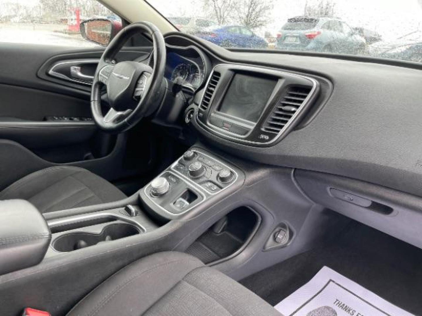 2015 Velvet Red Pearlcoat Chrysler 200 Limited (1C3CCCAB3FN) with an 2.4L L4 DOHC 16V engine, 9-Speed Automatic transmission, located at 401 Woodman Dr, Riverside, OH, 45431, (937) 908-9800, 39.763779, -84.122063 - Photo#7