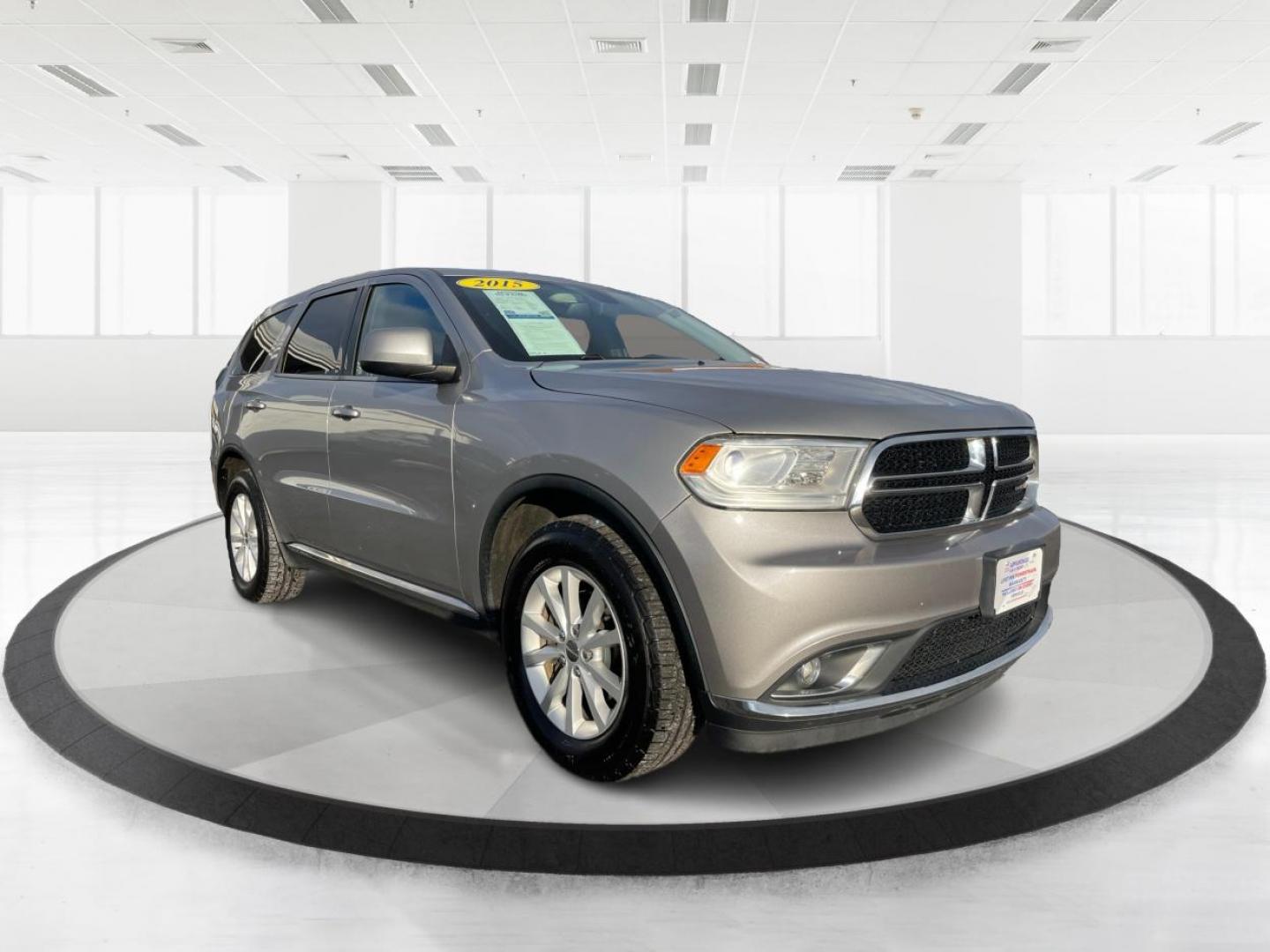 2015 Dodge Durango SXT AWD (1C4RDJAG2FC) with an 3.6L V6 DOHC 24V engine, 8-Speed Automatic transmission, located at 880 E. National Road, Vandalia, OH, 45377, (937) 908-9800, 39.891918, -84.183594 - Third Row - Photo#0