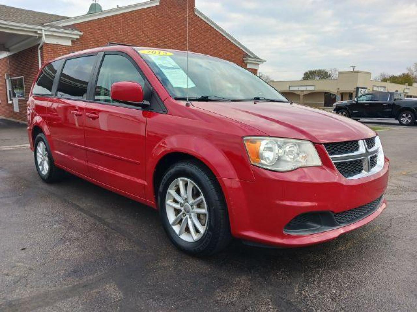 2015 Dp Cherry Red Crystal PC Dodge Grand Caravan SXT (2C4RDGCG1FR) with an 3.6L V6 DOHC 24V engine, 6-Speed Automatic transmission, located at 880 E. National Road, Vandalia, OH, 45377, (937) 908-9800, 39.892189, -84.181015 - Photo#0