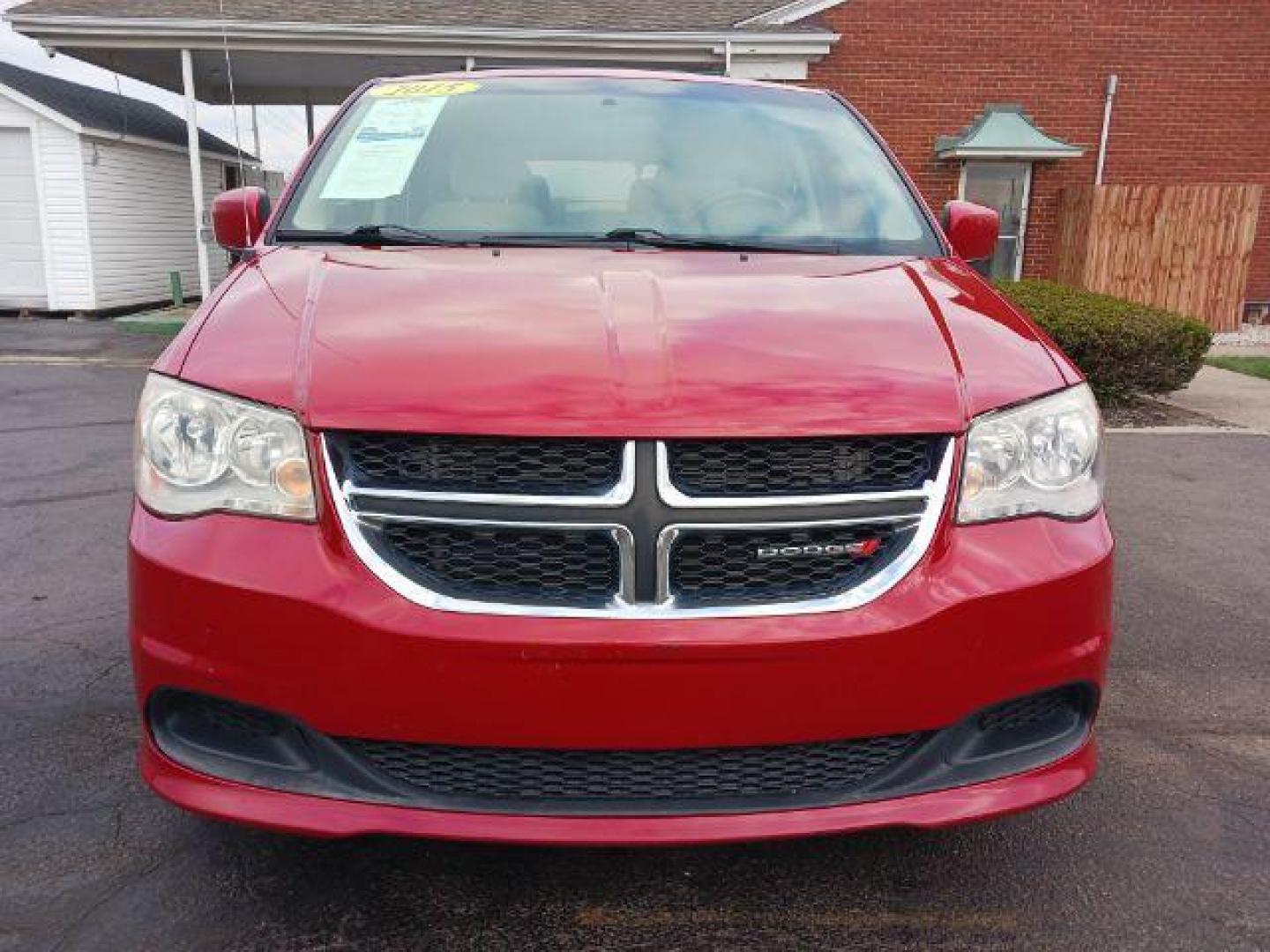 2015 Dp Cherry Red Crystal PC Dodge Grand Caravan SXT (2C4RDGCG1FR) with an 3.6L V6 DOHC 24V engine, 6-Speed Automatic transmission, located at 880 E. National Road, Vandalia, OH, 45377, (937) 908-9800, 39.892189, -84.181015 - Photo#1