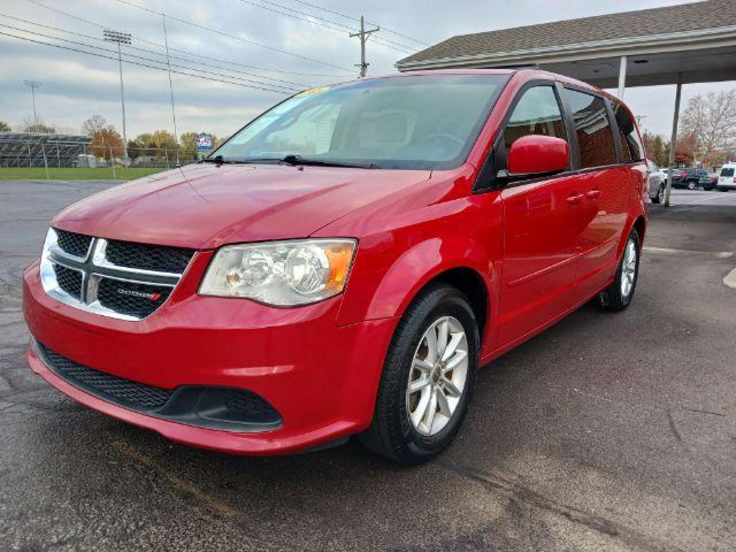 2015 Dp Cherry Red Crystal PC Dodge Grand Caravan SXT (2C4RDGCG1FR) with an 3.6L V6 DOHC 24V engine, 6-Speed Automatic transmission, located at 880 E. National Road, Vandalia, OH, 45377, (937) 908-9800, 39.892189, -84.181015 - Photo#2