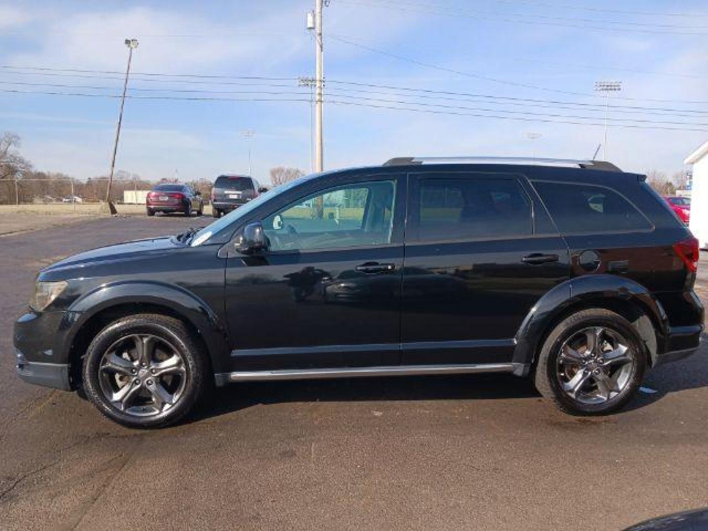 2015 Pitch Black Clearcoat Dodge Journey Crossroad AWD (3C4PDDGG1FT) with an 3.6L V6 DOHC 24V engine, 6-Speed Automatic transmission, located at 1099 N County Rd 25A, OH, 45373, (937) 908-9800, 40.057079, -84.212883 - Photo#3