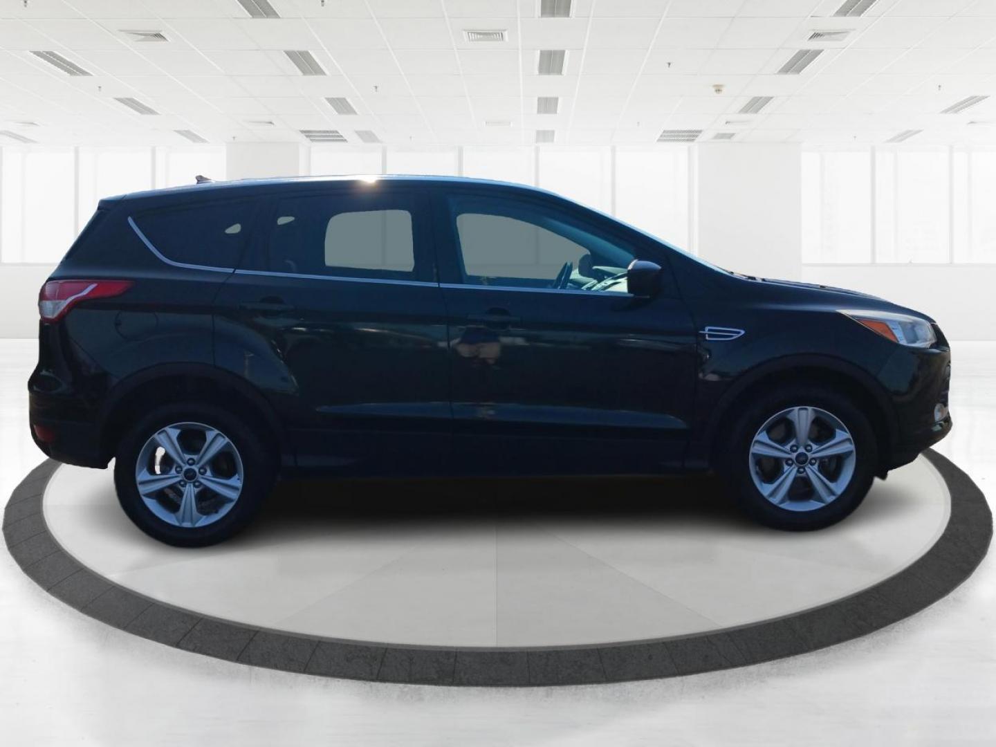 2015 Tuxedo Black Metallic Ford Escape (1FMCU9G99FU) with an 2.0L L4 DOHC 16V engine, 6-Speed Automatic transmission, located at 880 E. National Road, Vandalia, OH, 45377, (937) 908-9800, 39.892189, -84.181015 - Photo#1