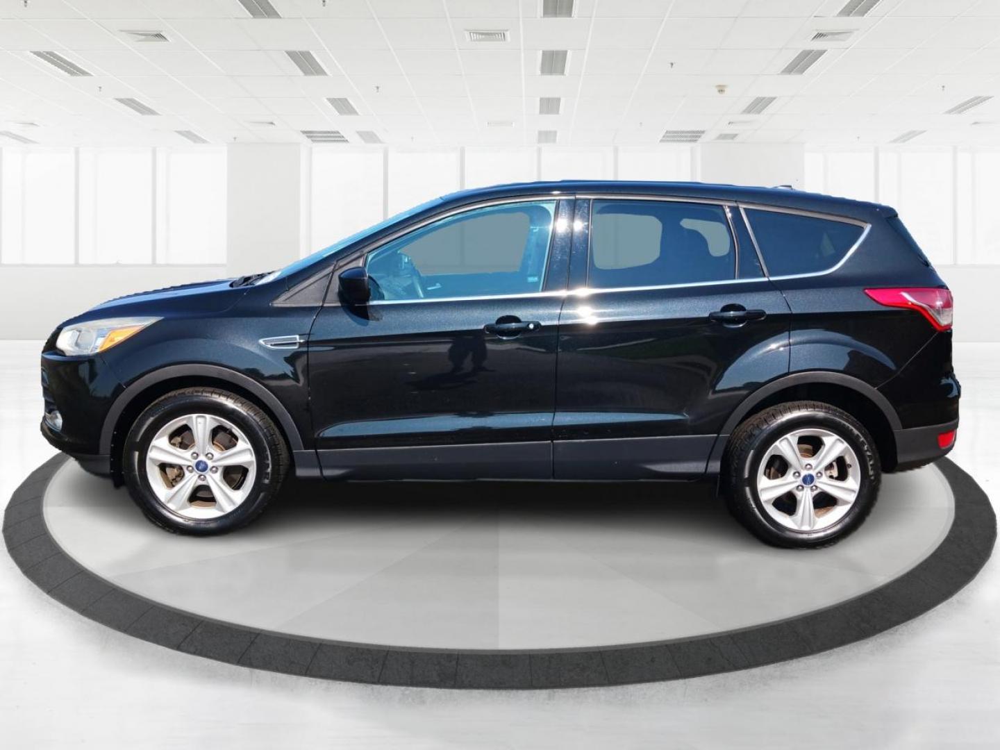 2015 Tuxedo Black Metallic Ford Escape (1FMCU9G99FU) with an 2.0L L4 DOHC 16V engine, 6-Speed Automatic transmission, located at 880 E. National Road, Vandalia, OH, 45377, (937) 908-9800, 39.892189, -84.181015 - Photo#5