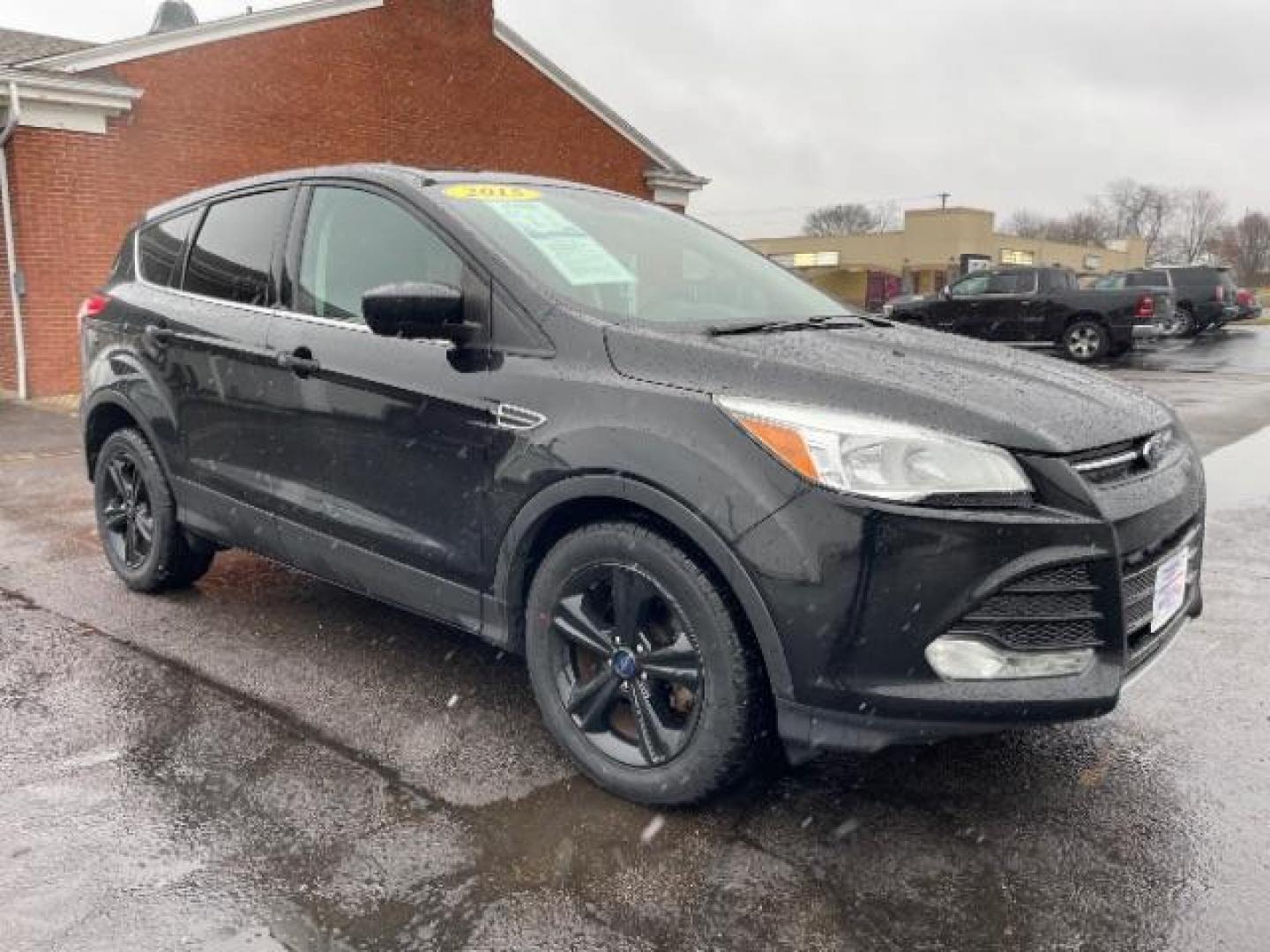 2015 Tuxedo Black Metallic Ford Escape SE FWD (1FMCU0G78FU) with an 2.5L L4 DOHC 16V engine, 6-Speed Automatic transmission, located at 1230 East Main St, Xenia, OH, 45385, (937) 908-9800, 39.687321, -83.910294 - Photo#0