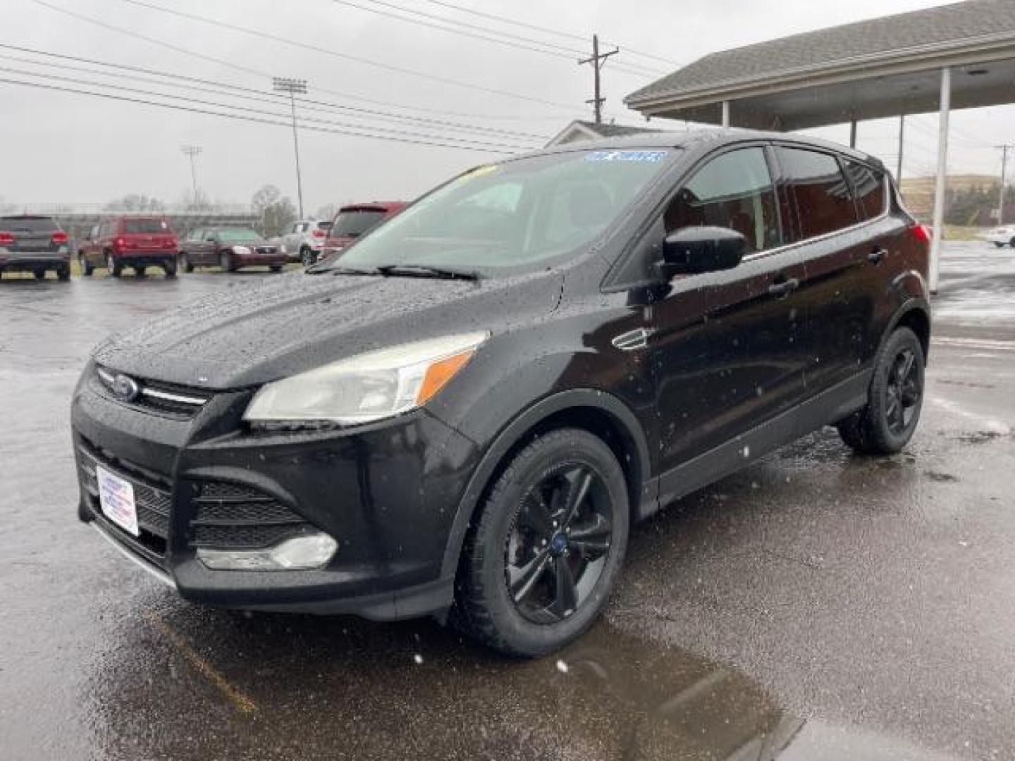 2015 Tuxedo Black Metallic Ford Escape SE FWD (1FMCU0G78FU) with an 2.5L L4 DOHC 16V engine, 6-Speed Automatic transmission, located at 1230 East Main St, Xenia, OH, 45385, (937) 908-9800, 39.687321, -83.910294 - Photo#1