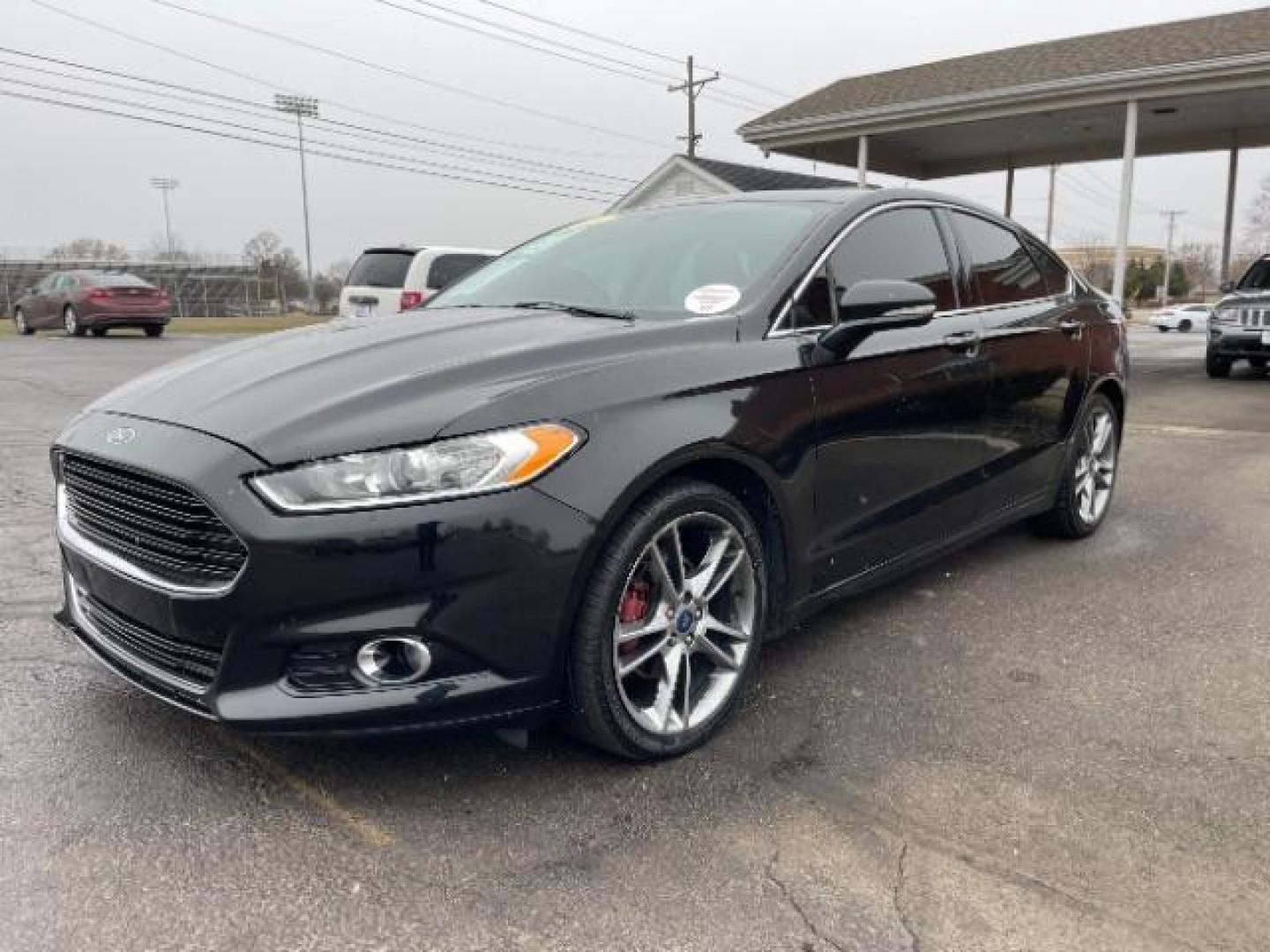 2015 Tuxedo Black Ford Fusion Titanium (3FA6P0K99FR) with an 2.0L L4 DOHC 16V engine, 6-Speed Automatic transmission, located at 401 Woodman Dr, Riverside, OH, 45431, (937) 908-9800, 39.763779, -84.122063 - Photo#1