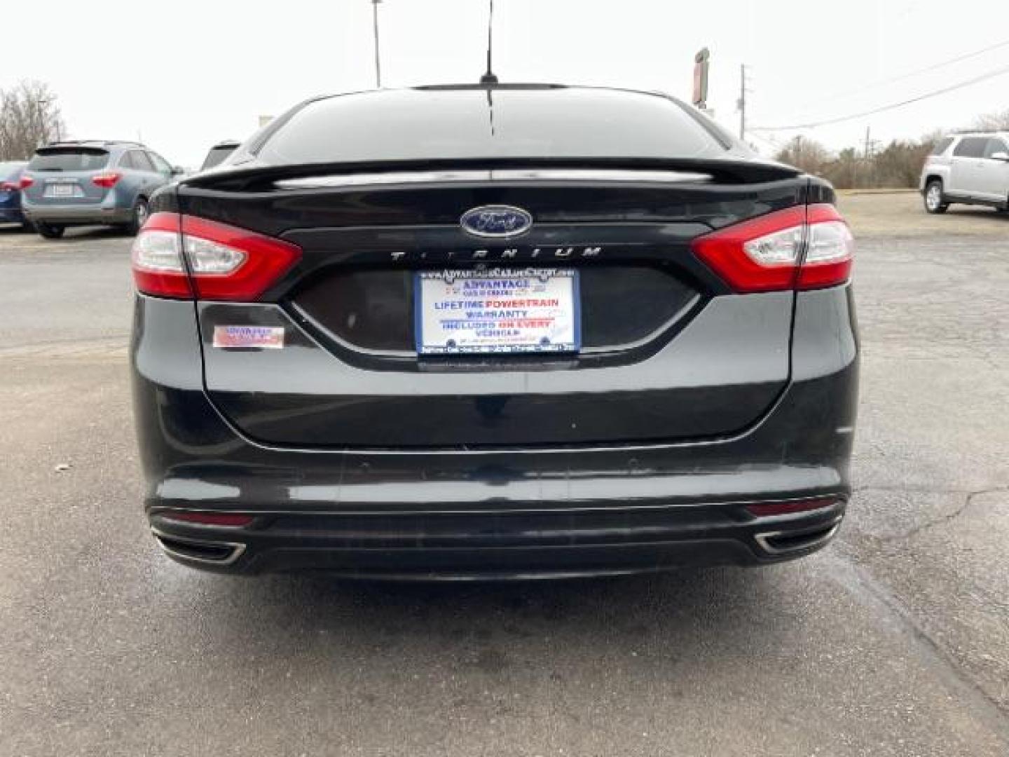 2015 Tuxedo Black Ford Fusion Titanium (3FA6P0K99FR) with an 2.0L L4 DOHC 16V engine, 6-Speed Automatic transmission, located at 401 Woodman Dr, Riverside, OH, 45431, (937) 908-9800, 39.763779, -84.122063 - Photo#5