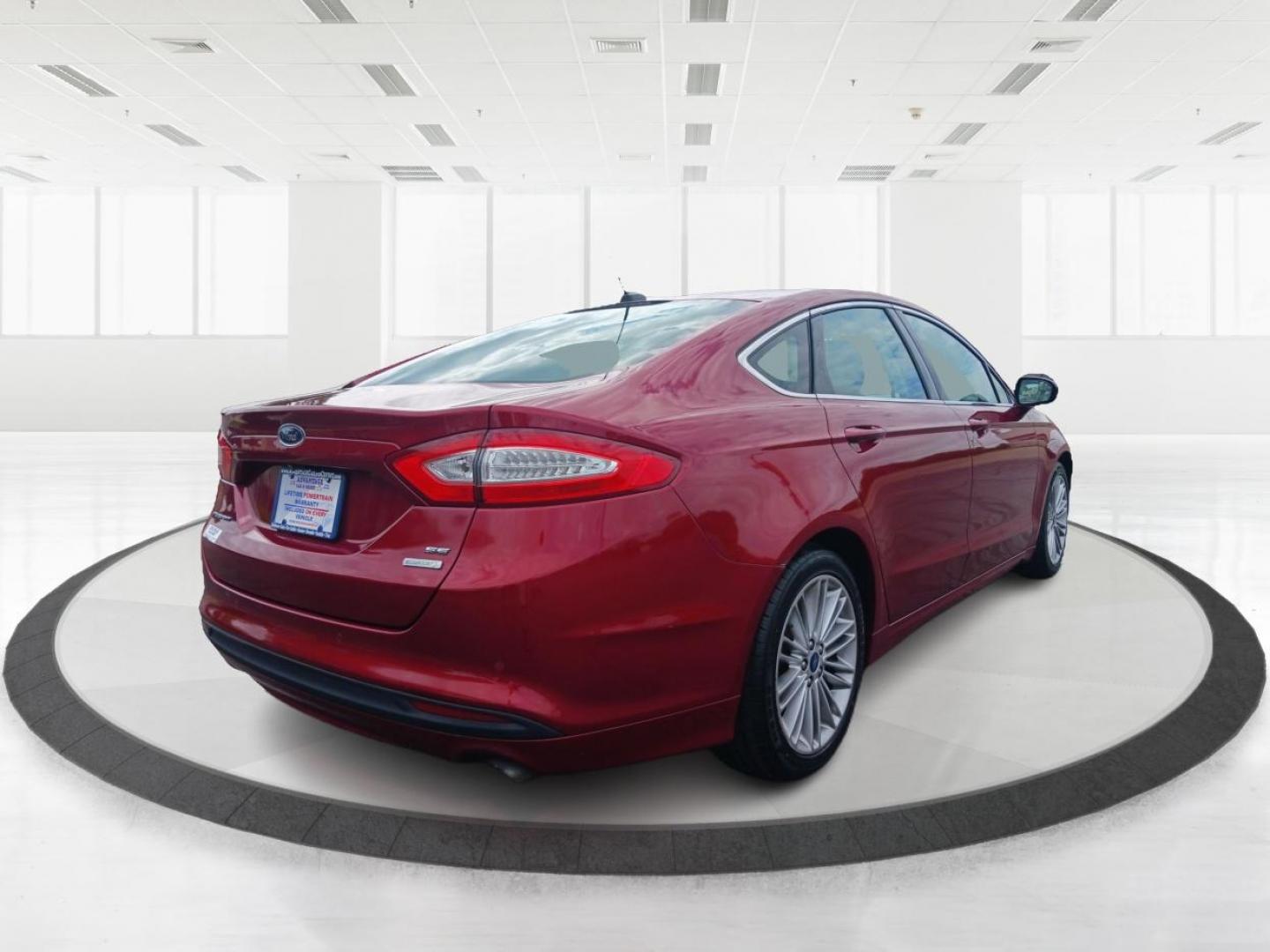 2015 Ruby Red Tinted CC Ford Fusion (3FA6P0HD2FR) with an 1.5L L4 DOHC 16V engine, 6-Speed Automatic transmission, located at 401 Woodman Dr, Riverside, OH, 45431, (937) 908-9800, 39.763779, -84.122063 - Photo#2