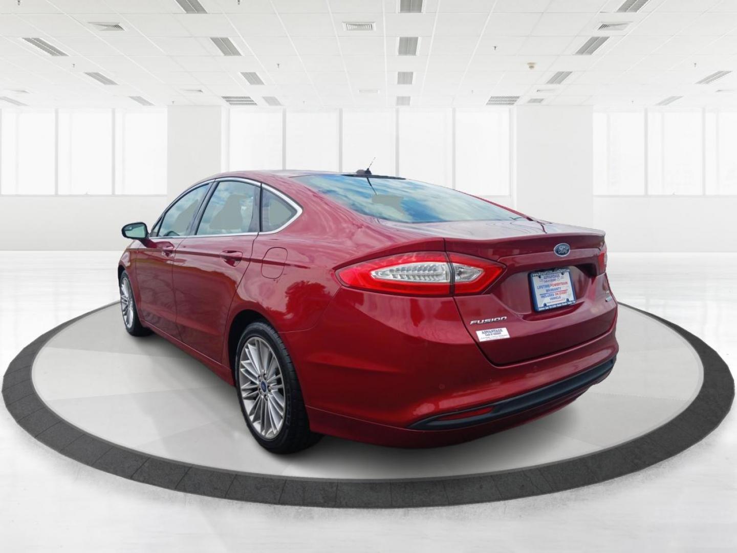 2015 Ruby Red Tinted CC Ford Fusion (3FA6P0HD2FR) with an 1.5L L4 DOHC 16V engine, 6-Speed Automatic transmission, located at 401 Woodman Dr, Riverside, OH, 45431, (937) 908-9800, 39.763779, -84.122063 - Photo#4